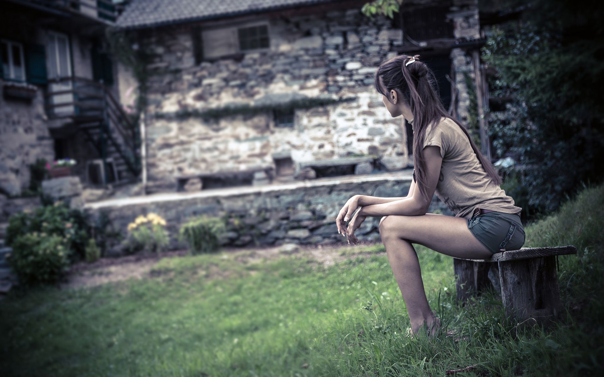Girl in shorts on bench