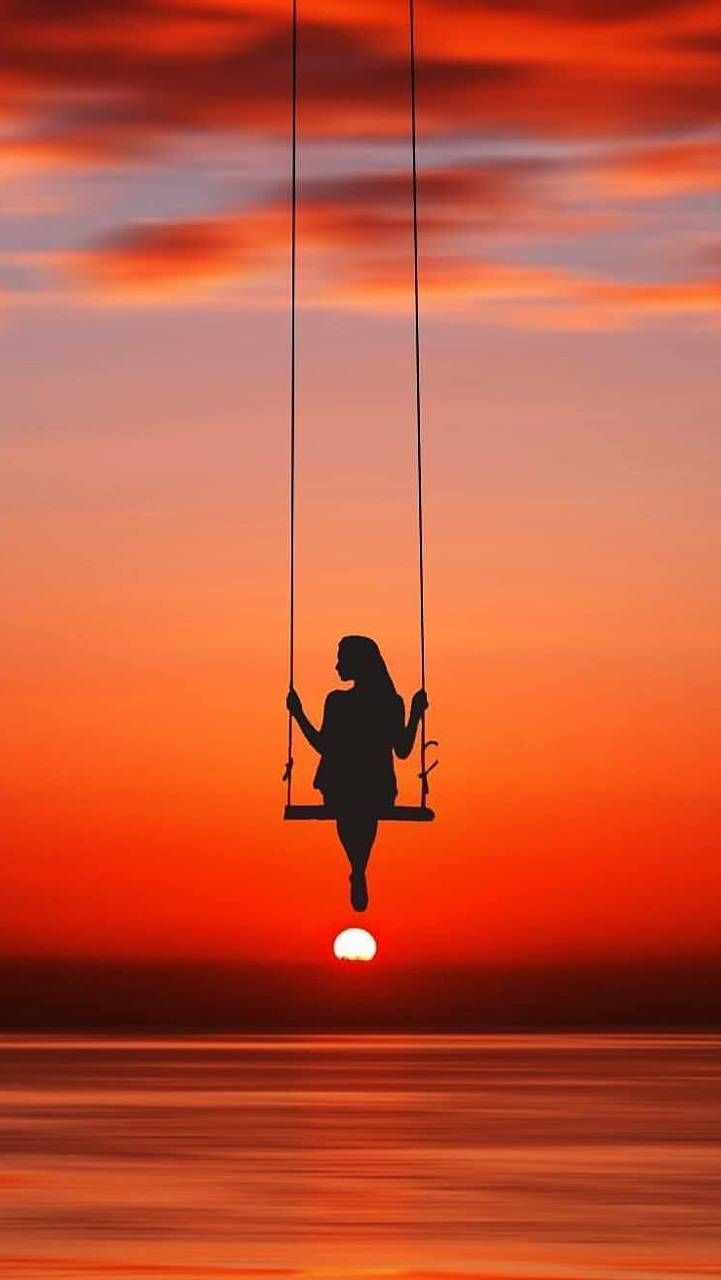 Girl on a swing wallpaper