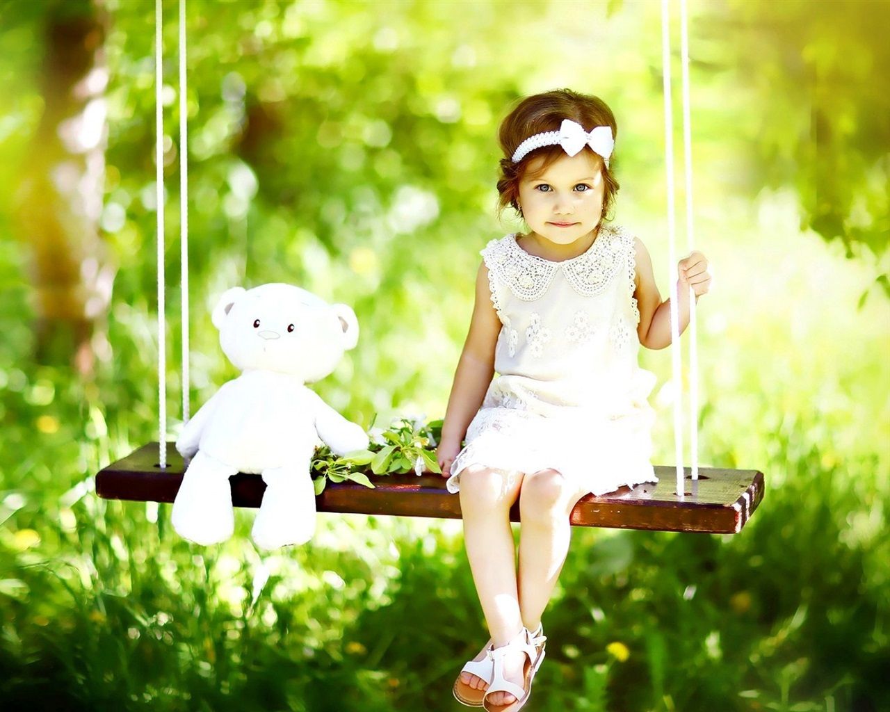 Cute Baby Girl Image In Swing