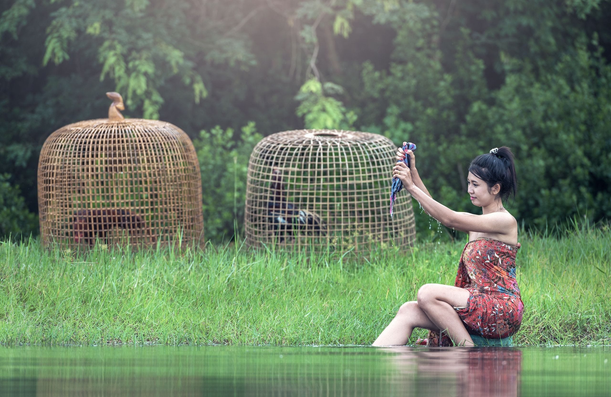 HD Asian Woman Washing River Wallpaper