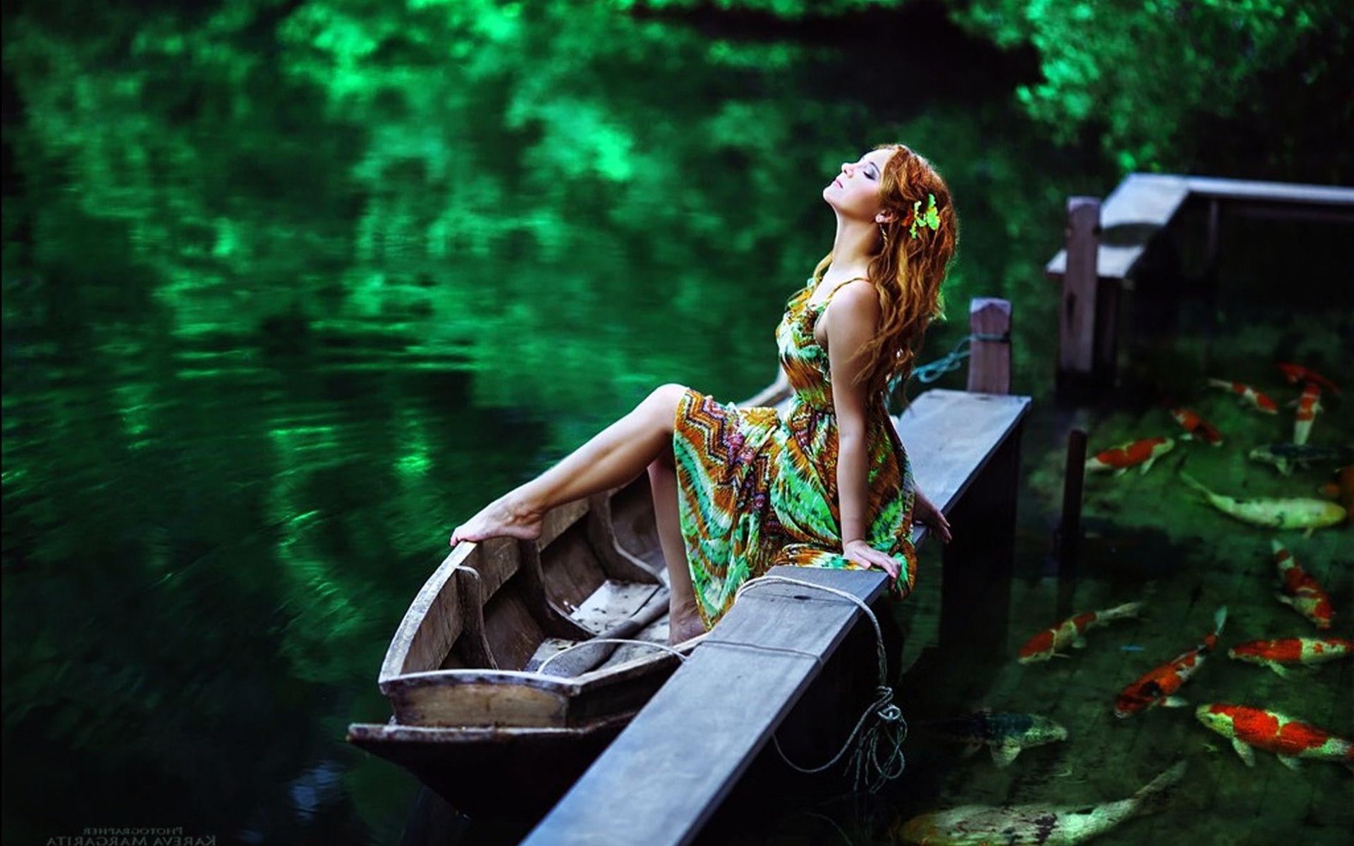 Pretty Girl In Lake with Boat wallpaper
