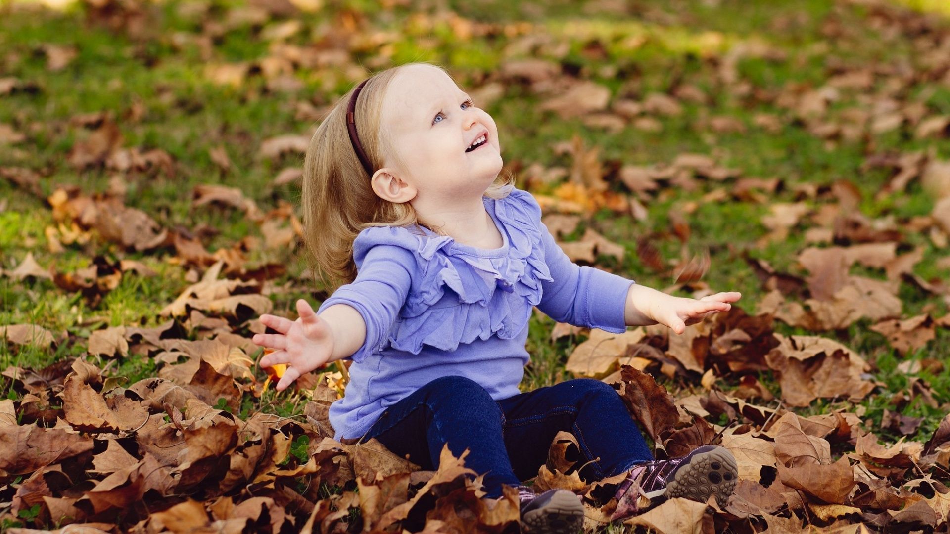 Happy Girl Autumn Leaves Wallpaper