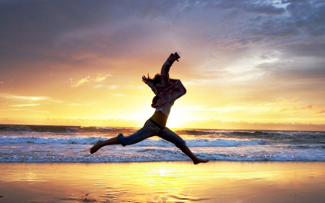 Download wallpaper 1280x800 beach, people, jump, sunset, sea