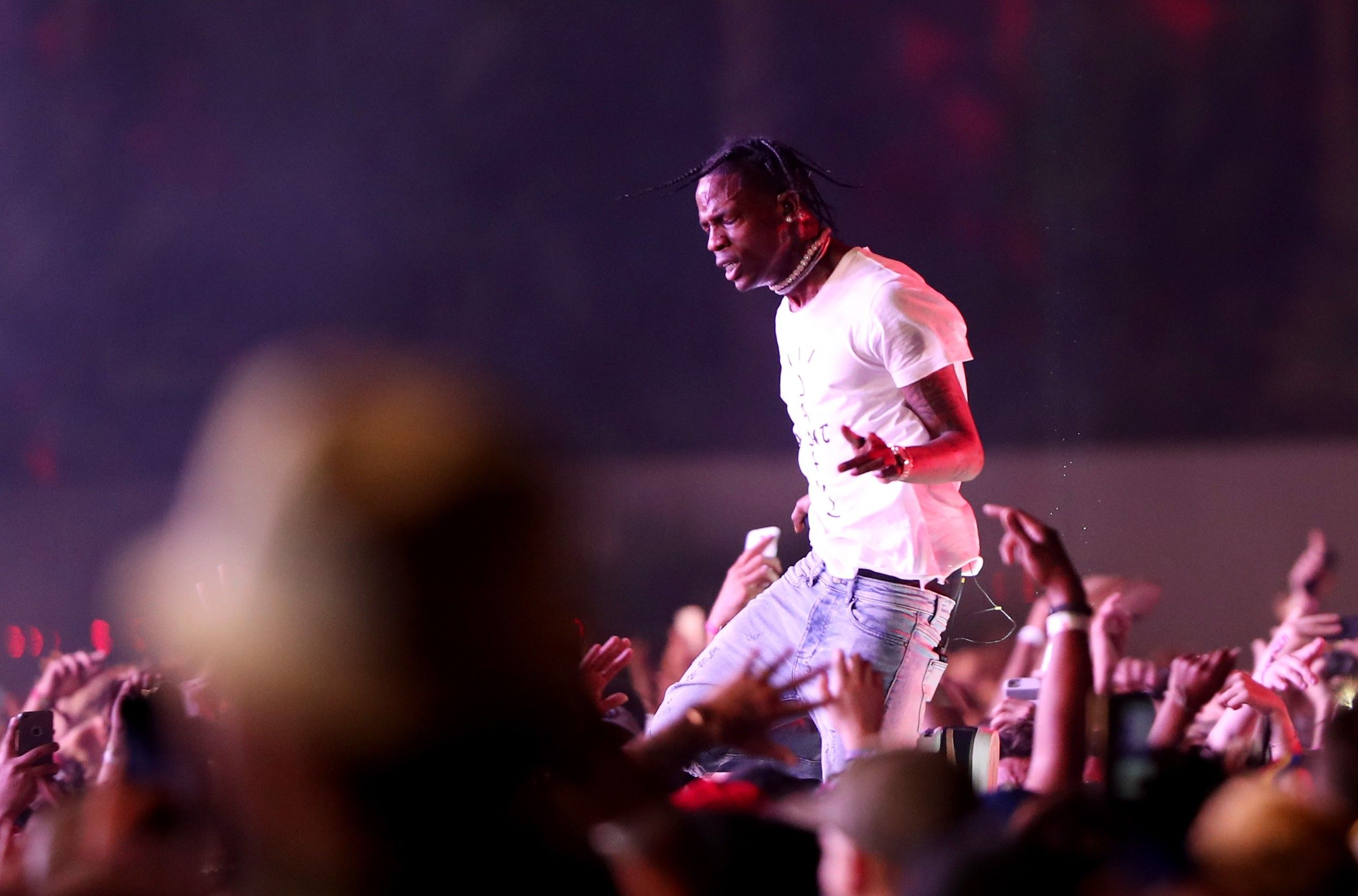 Travis Scott Claims He's Not Responsible For Fans Who Jumped From