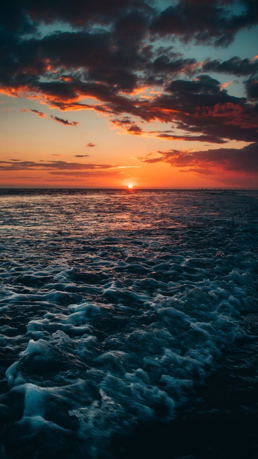 Sunset on the beach android wallpaper