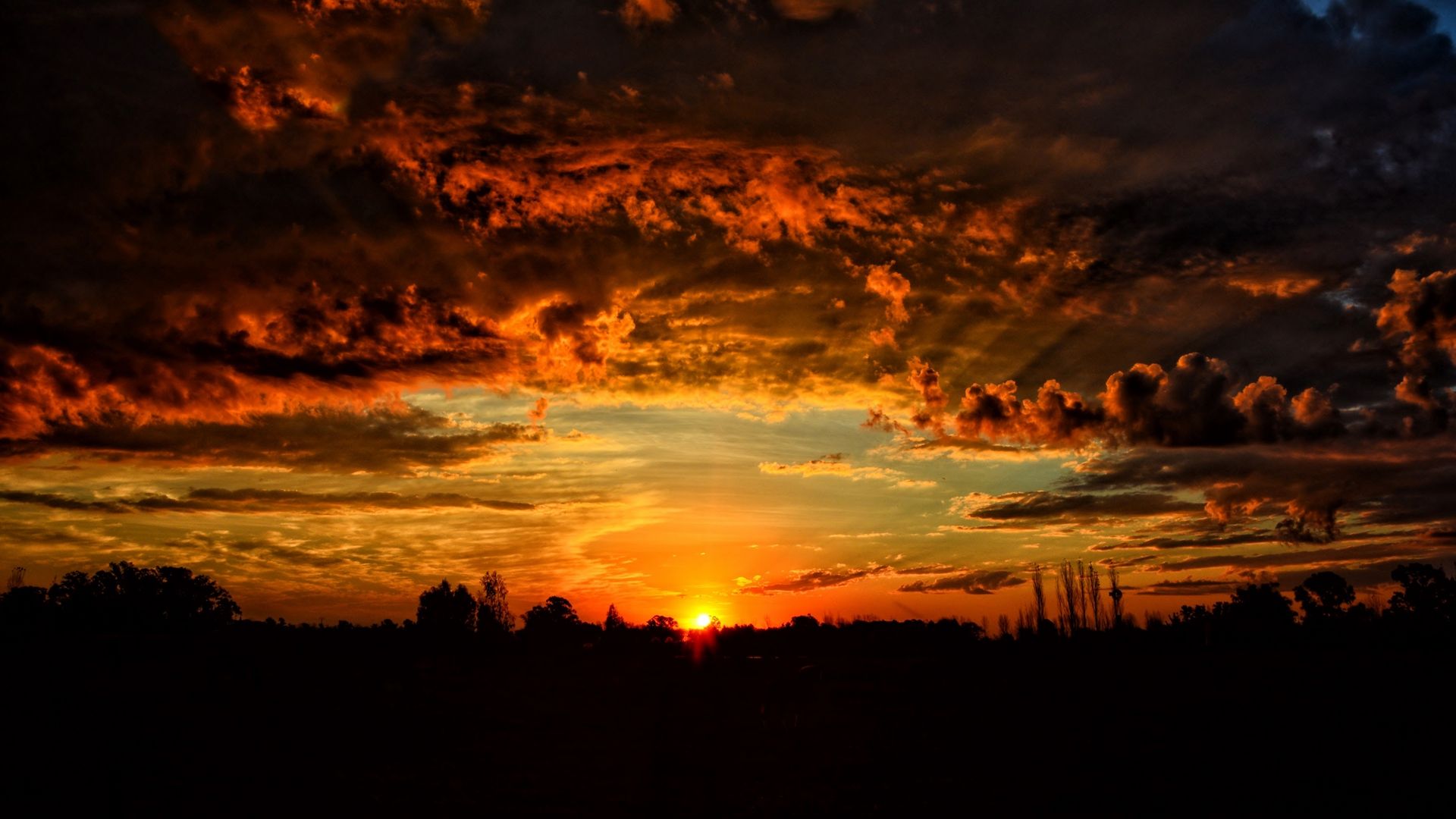 Download wallpaper 1920x1080 sunset, clouds, orange sky full HD