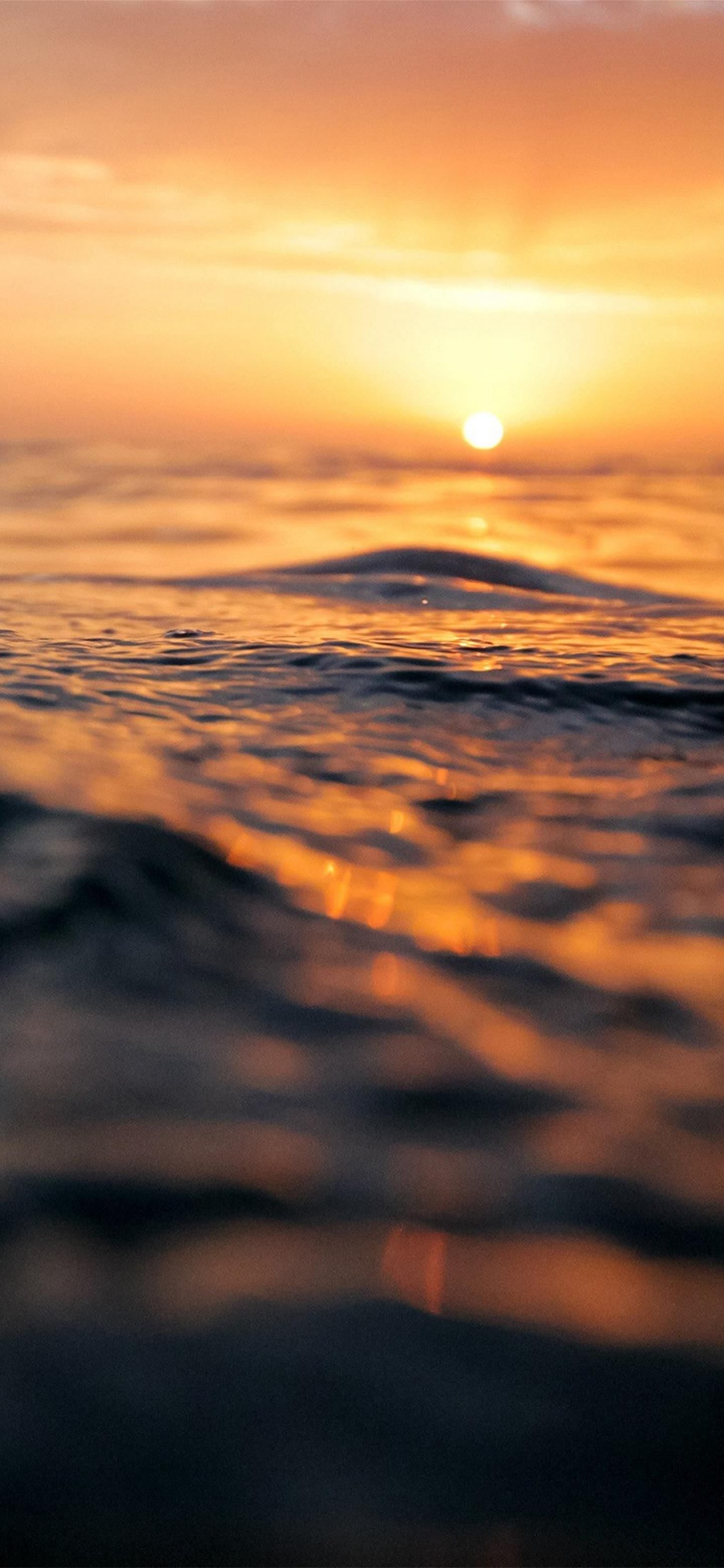 Sunset Sea Water Bokeh Orange Nature Phone Wallpaper