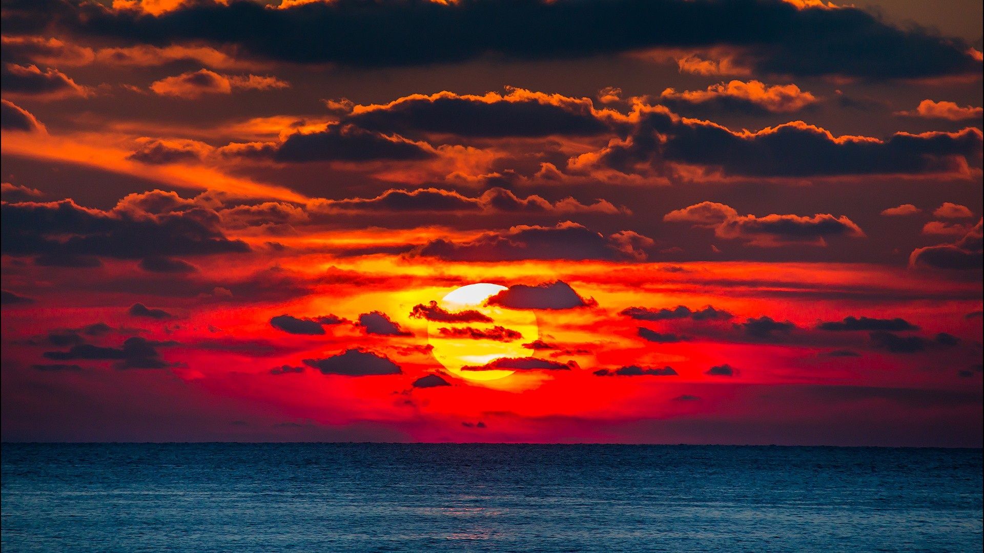 Sun going down over the ocean HD Wallpaper. Background Image