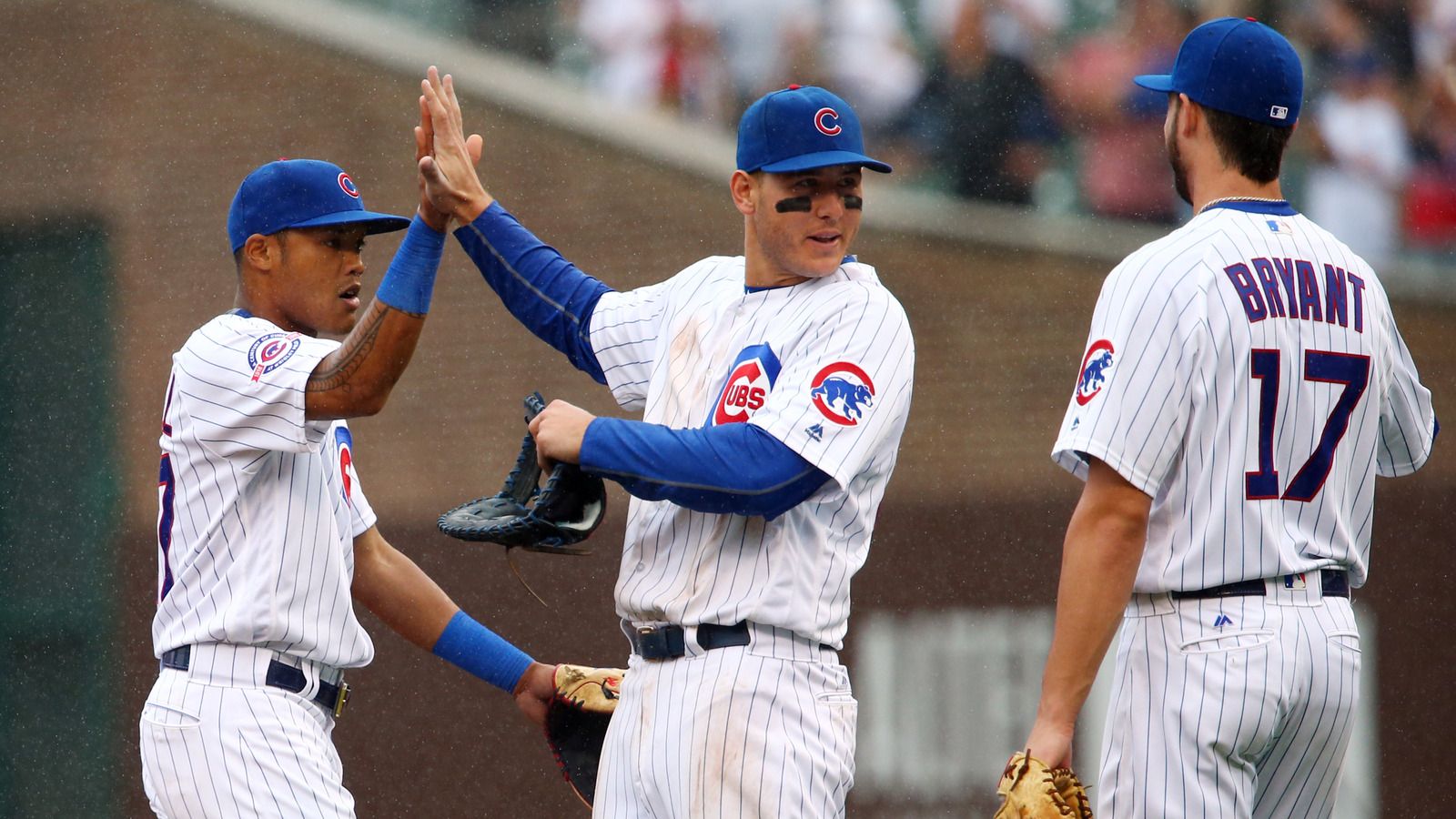 Addison Russell, Anthony Rizzo And Kris Bryant Give