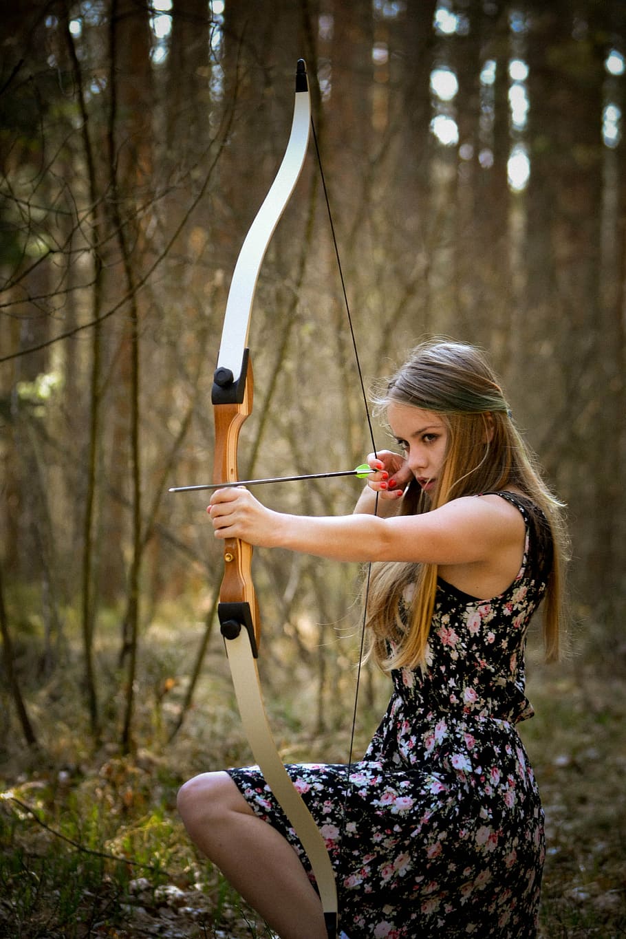 HD wallpaper: woman in black floral dress holding bow and arrow