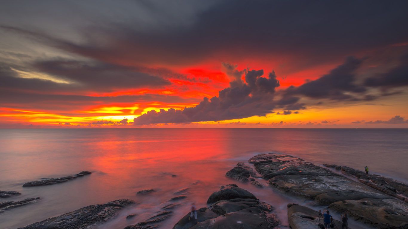 Red Sky Dark Clouds Reflection Sunset At The Coast Of Borneo
