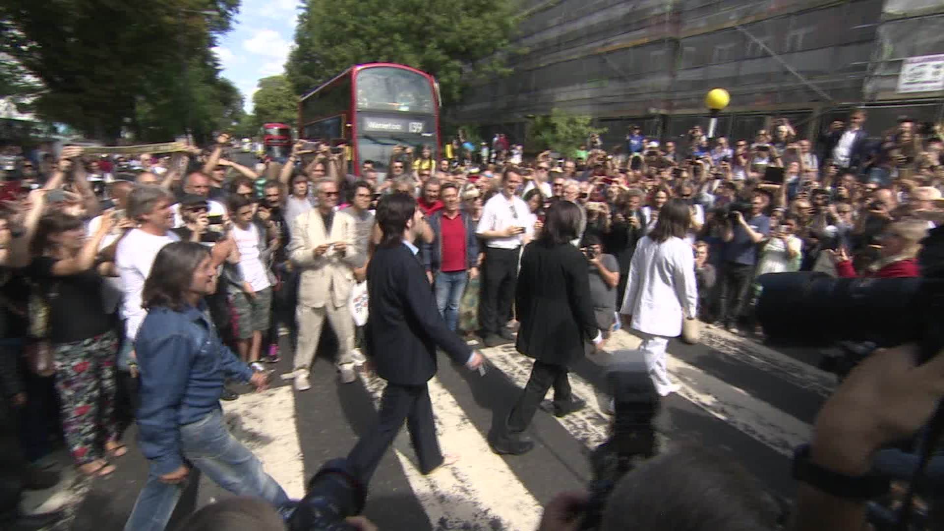 Fans gather for The Beatles' Abbey Road photo on 50th anniversary