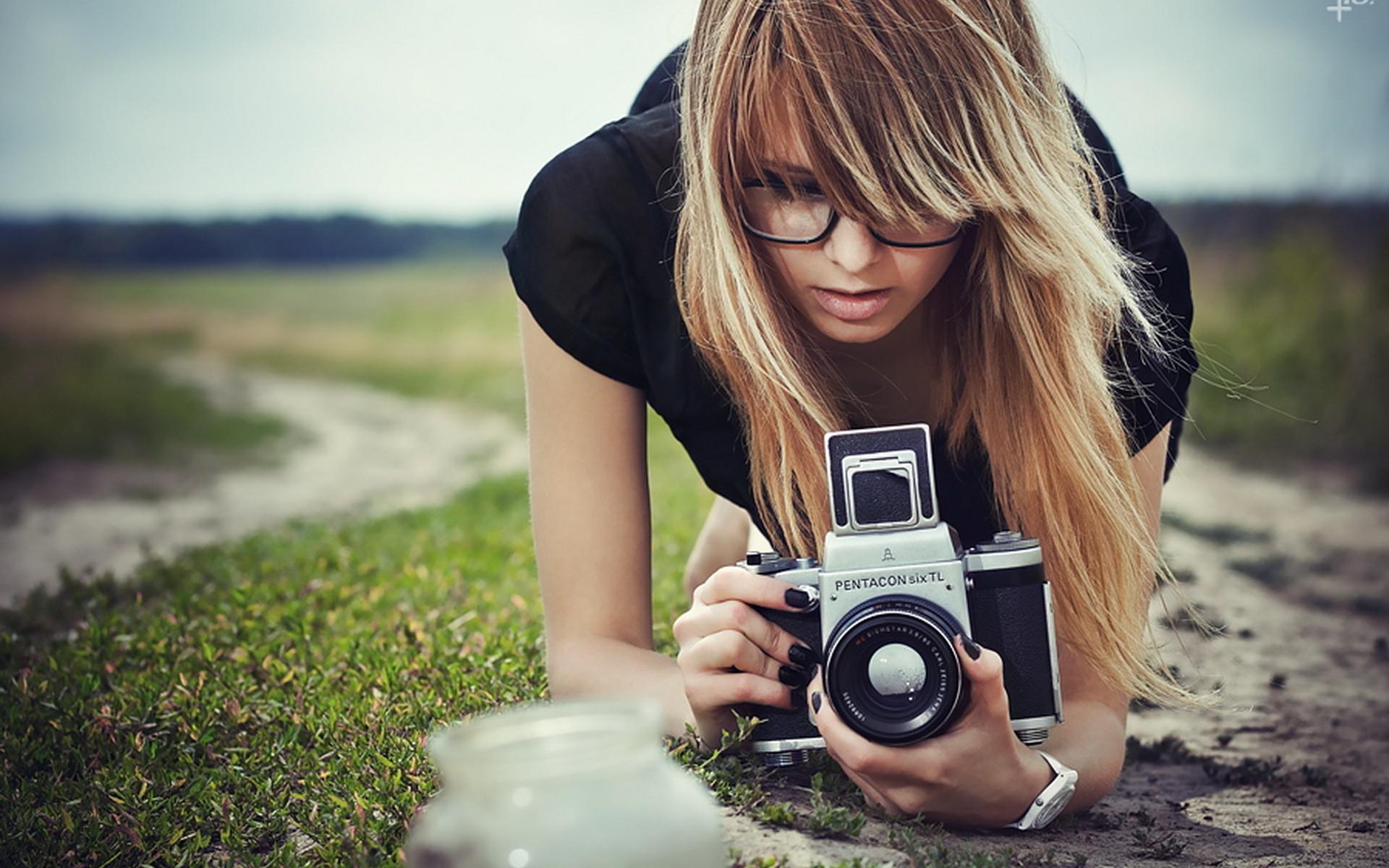 Hipster girl taking picture wallpaper