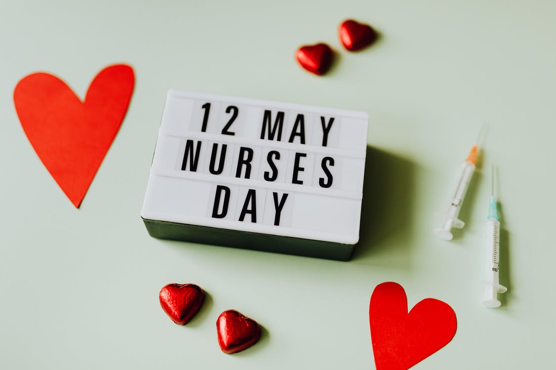 Nurses Day Sign with Hearts and Syringes · Free