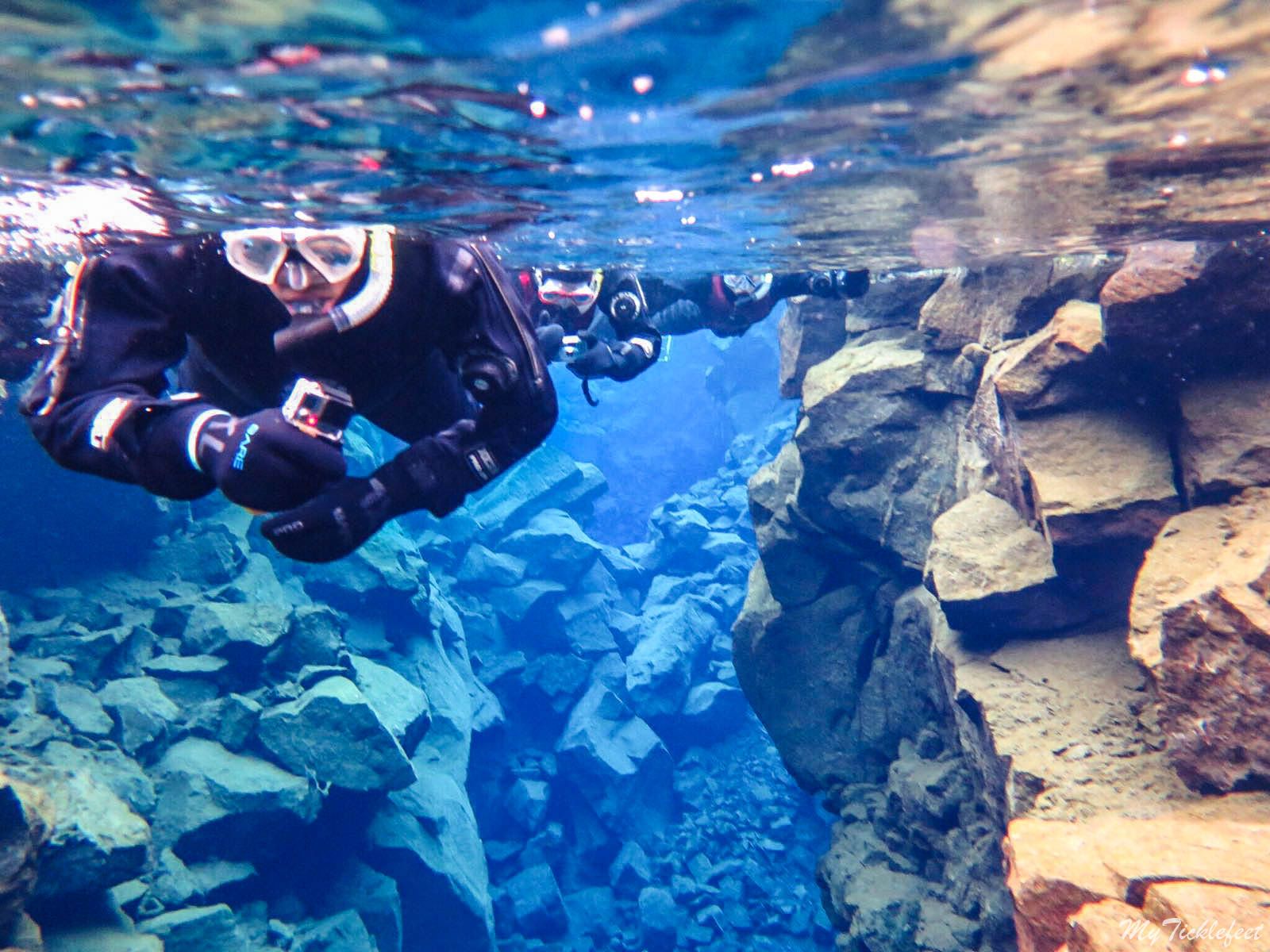 Snorkelling Diving Between The Tectonic Plates In Silfra, Iceland