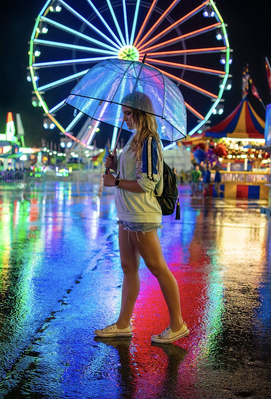 HD wallpaper: woman walking on pavement holding umbrella, carnival