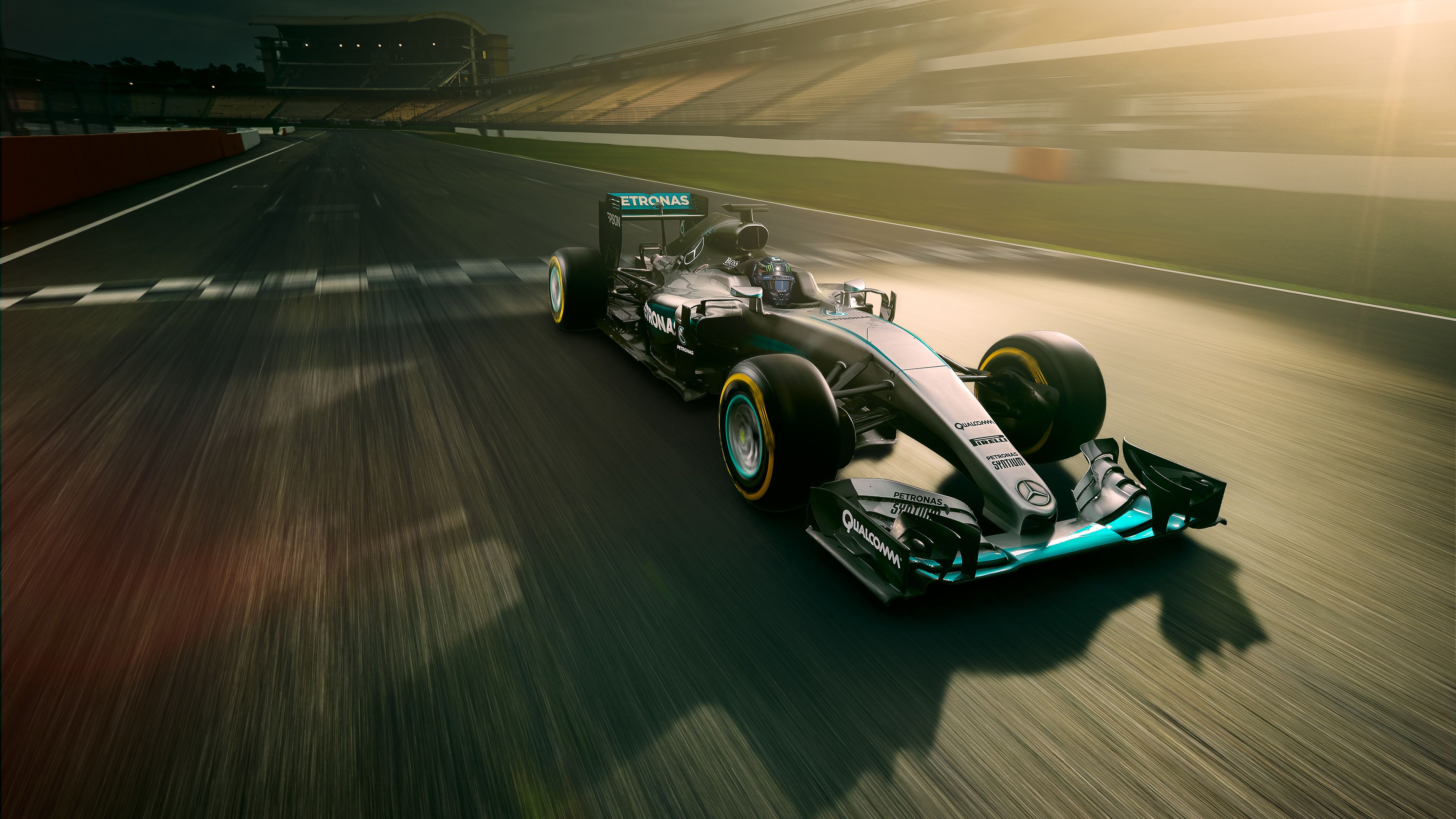 Mercedes F1 in Race track 4K Wallpapers