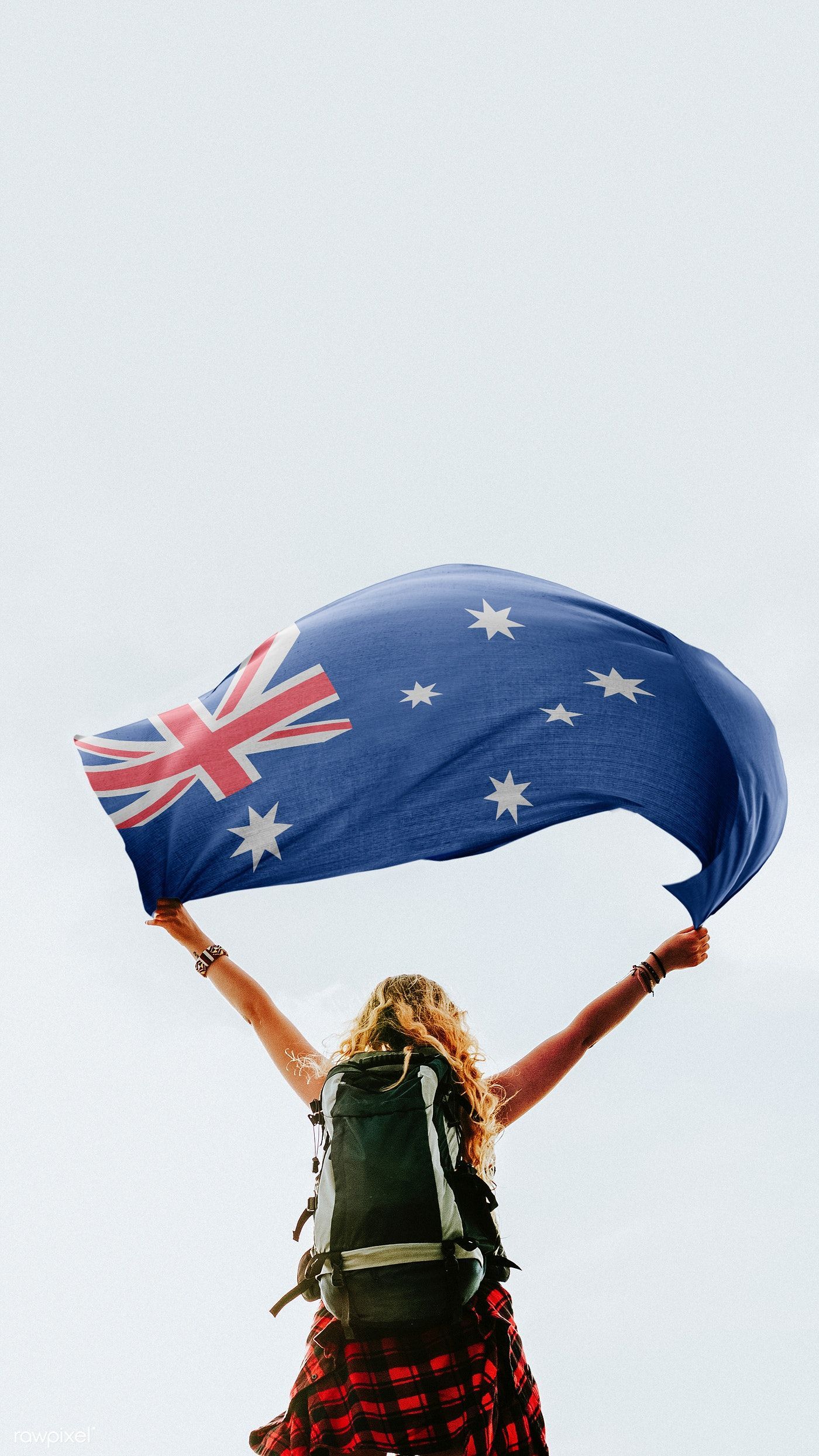 Download premium photo of Woman holding the Australian flag mobile
