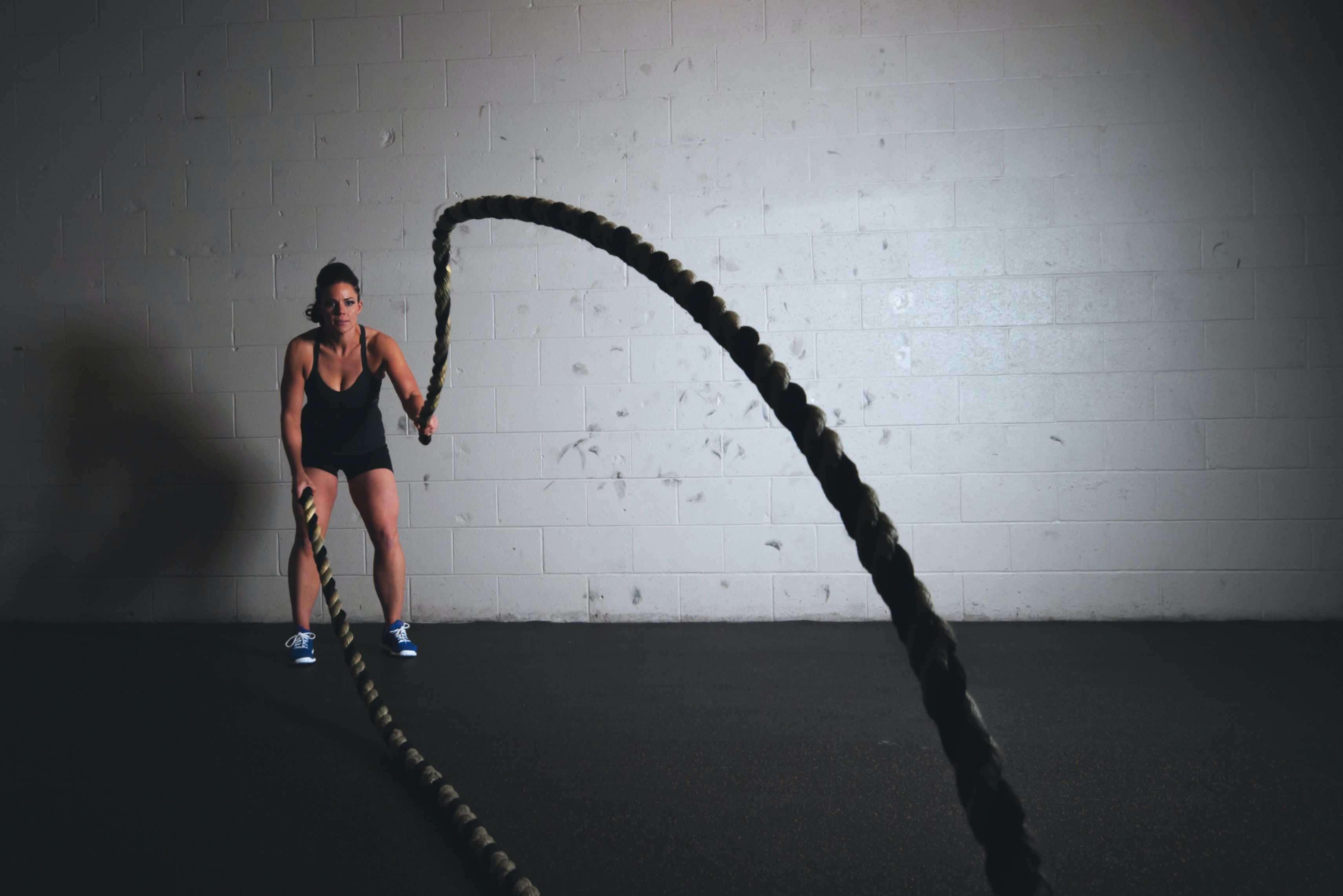 Woman Holding Exercise Ropes · Free