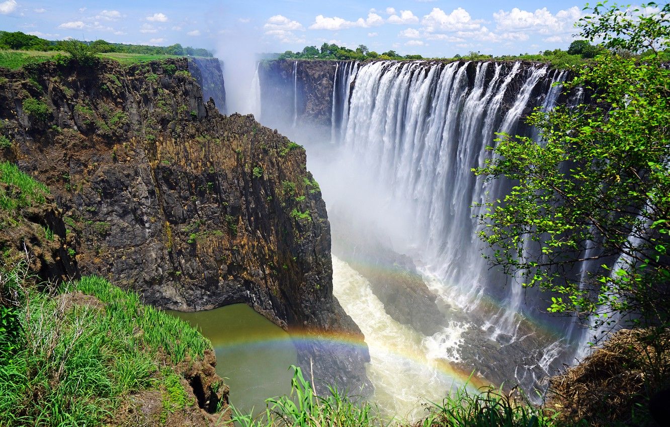 Wallpaper the sky, the sun, clouds, trees, stones, rocks, waterfall, canyon, Victoria Falls, Rainbow Falls, Zambia image for desktop, section природа