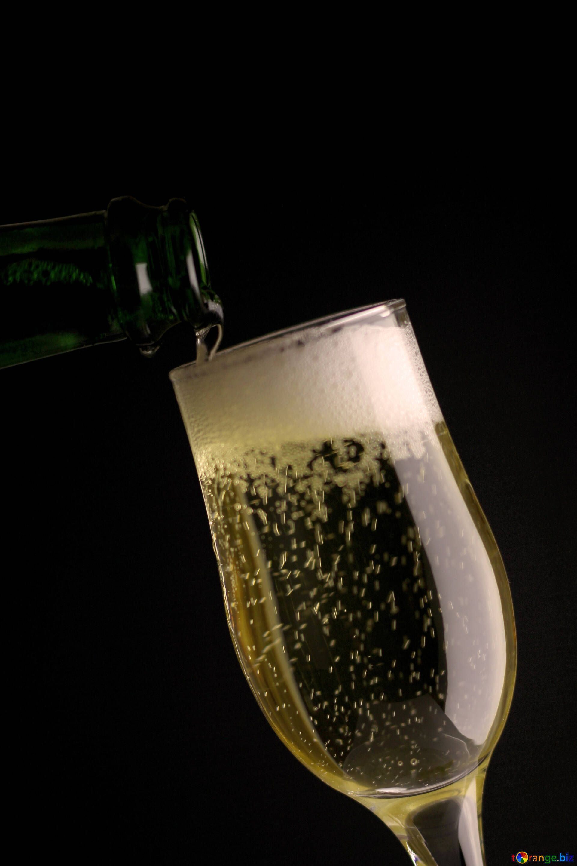 Champagne against a dark background glass of wine champagne № 25742