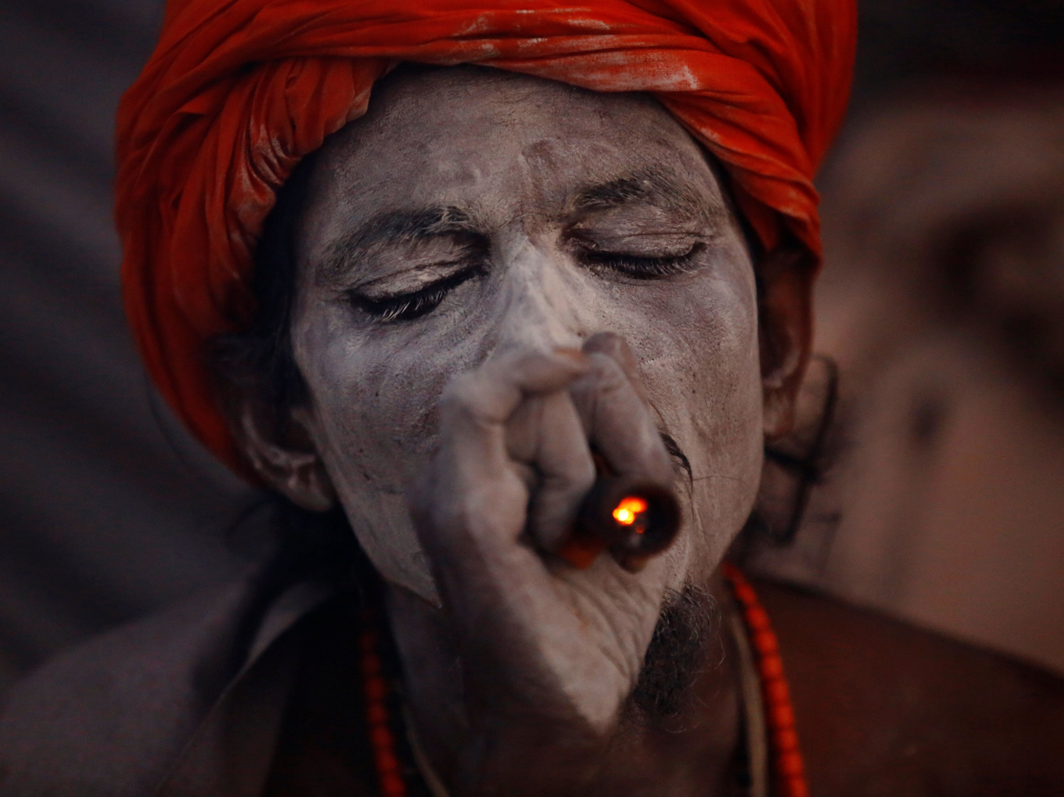 Maha Shivaratri 2017: Stunning image show holy men smoking