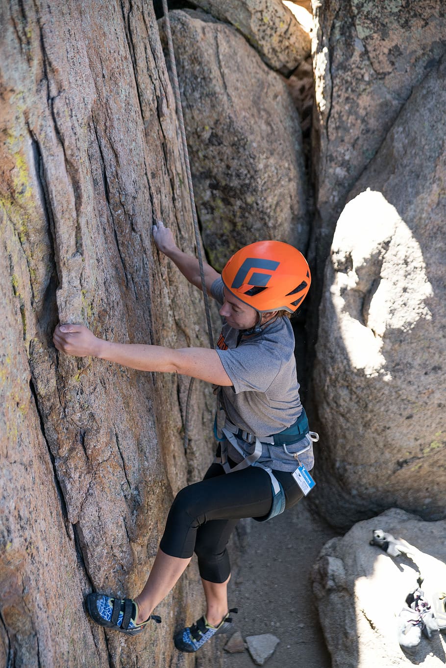 HD wallpaper: woman in orange helmet and safety gear climbing