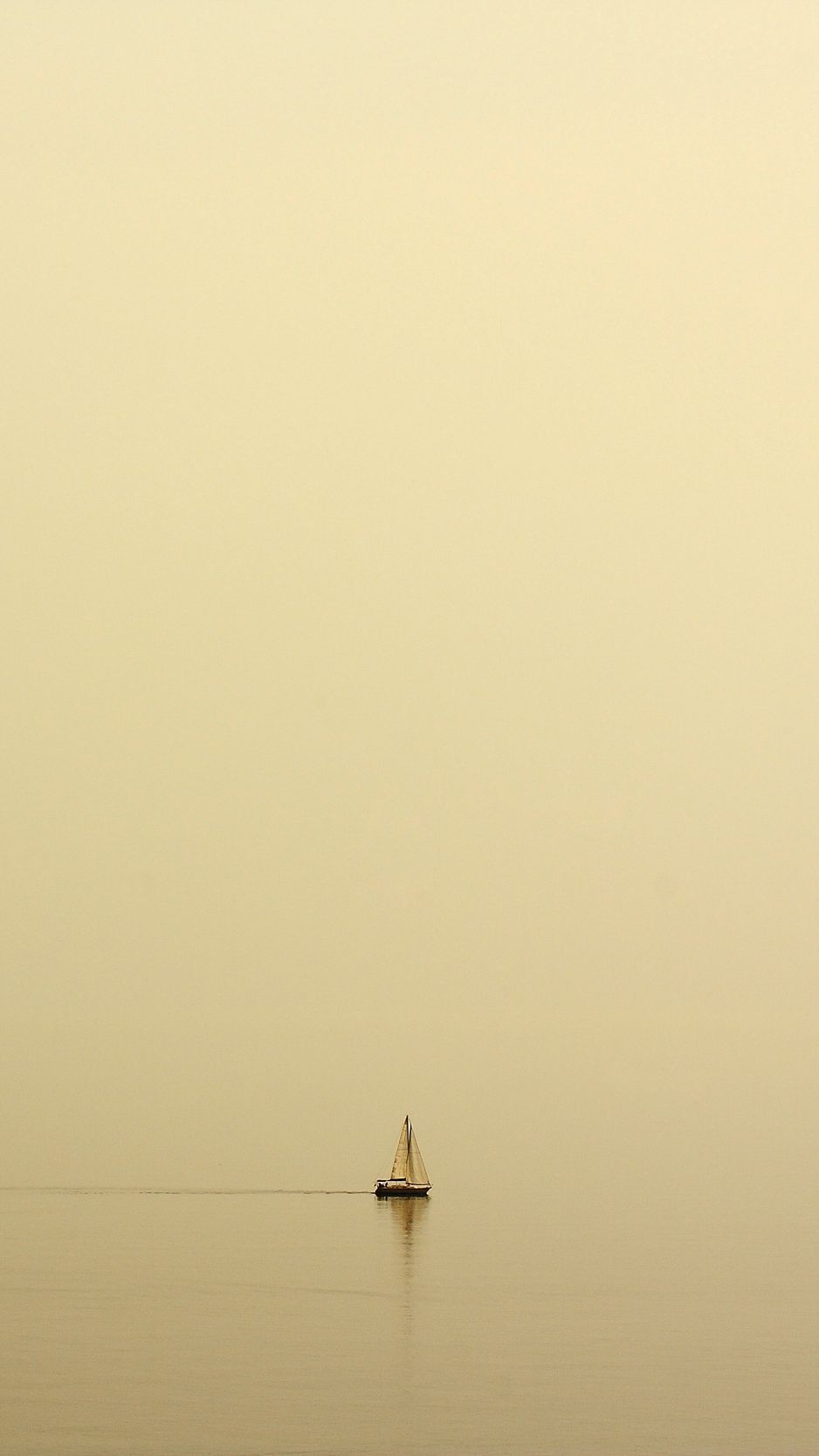 Download wallpaper 938x1668 sailboat, sea, fog, uniform, lonely