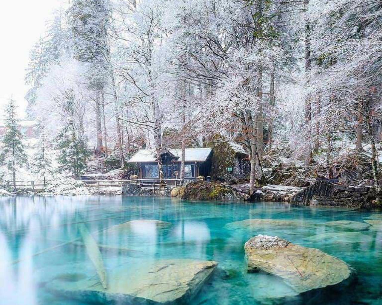 Loving the white and blue colours of Lake Blausee during winter, Switzerland