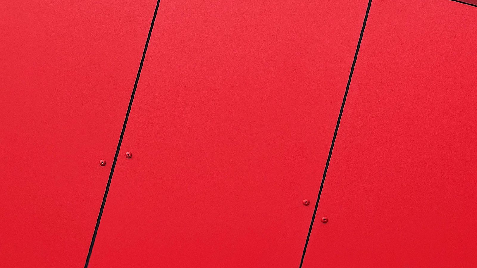 Download wallpaper 1600x900 wall, red, surface, minimalism