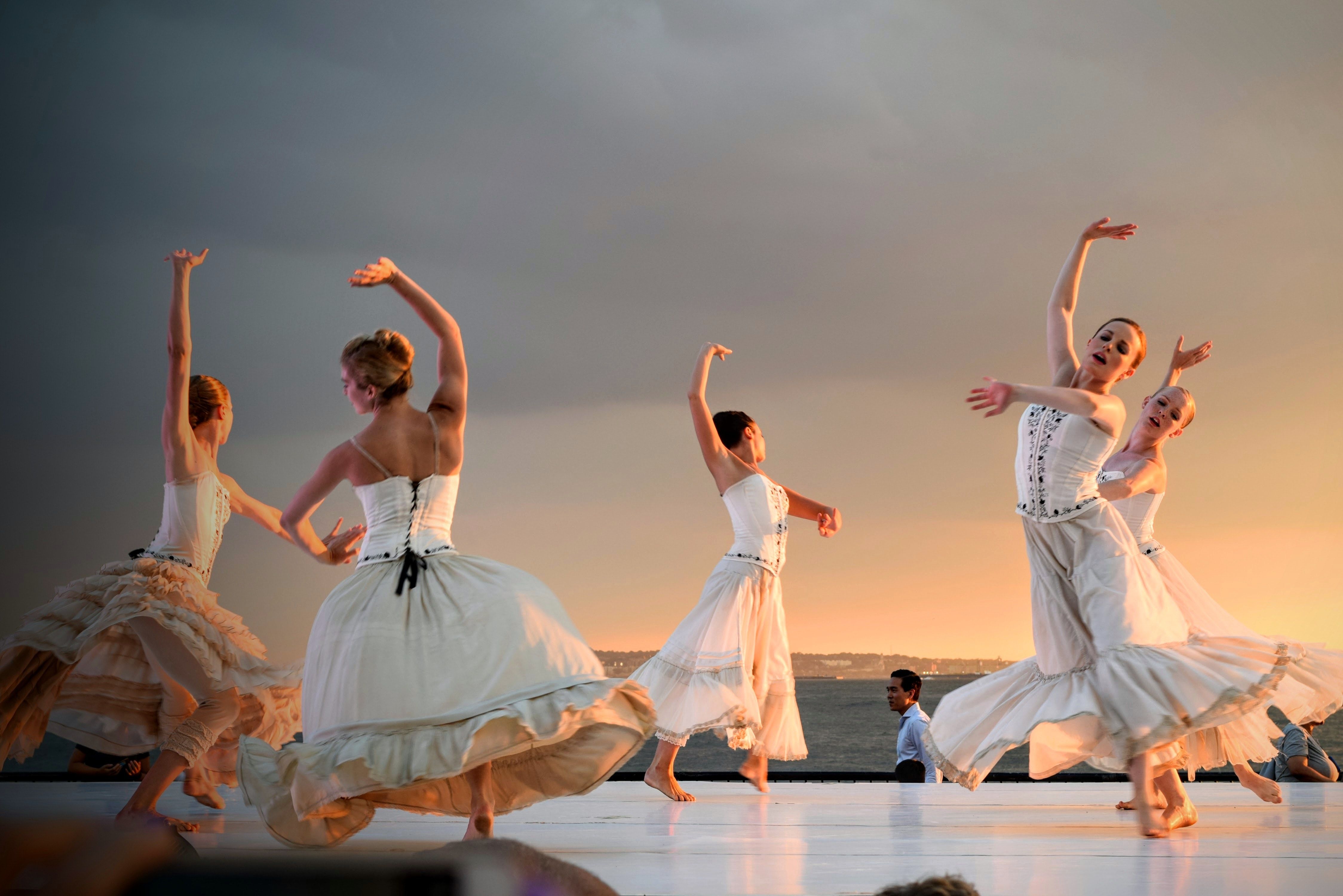 Women in White Dress Dancing Under Gray Sky during Sunset · Free