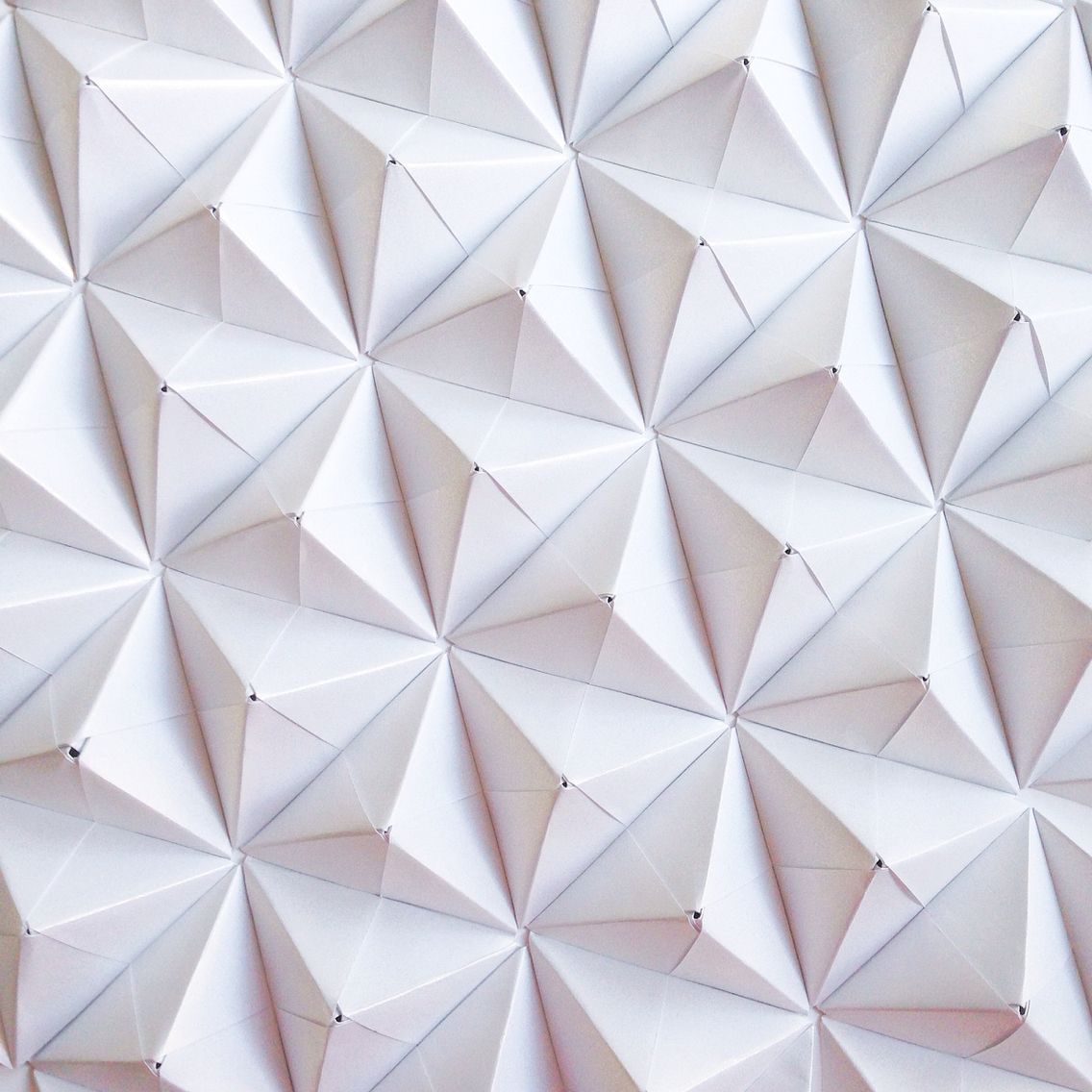 Sonobe unit origami improvisation by Coco Sato. Marble desktop