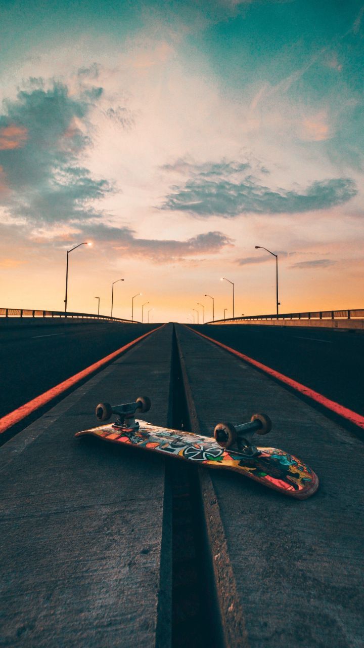 Skateboard, road, marks, sunset, 720x1280 wallpaper. Fond d écran
