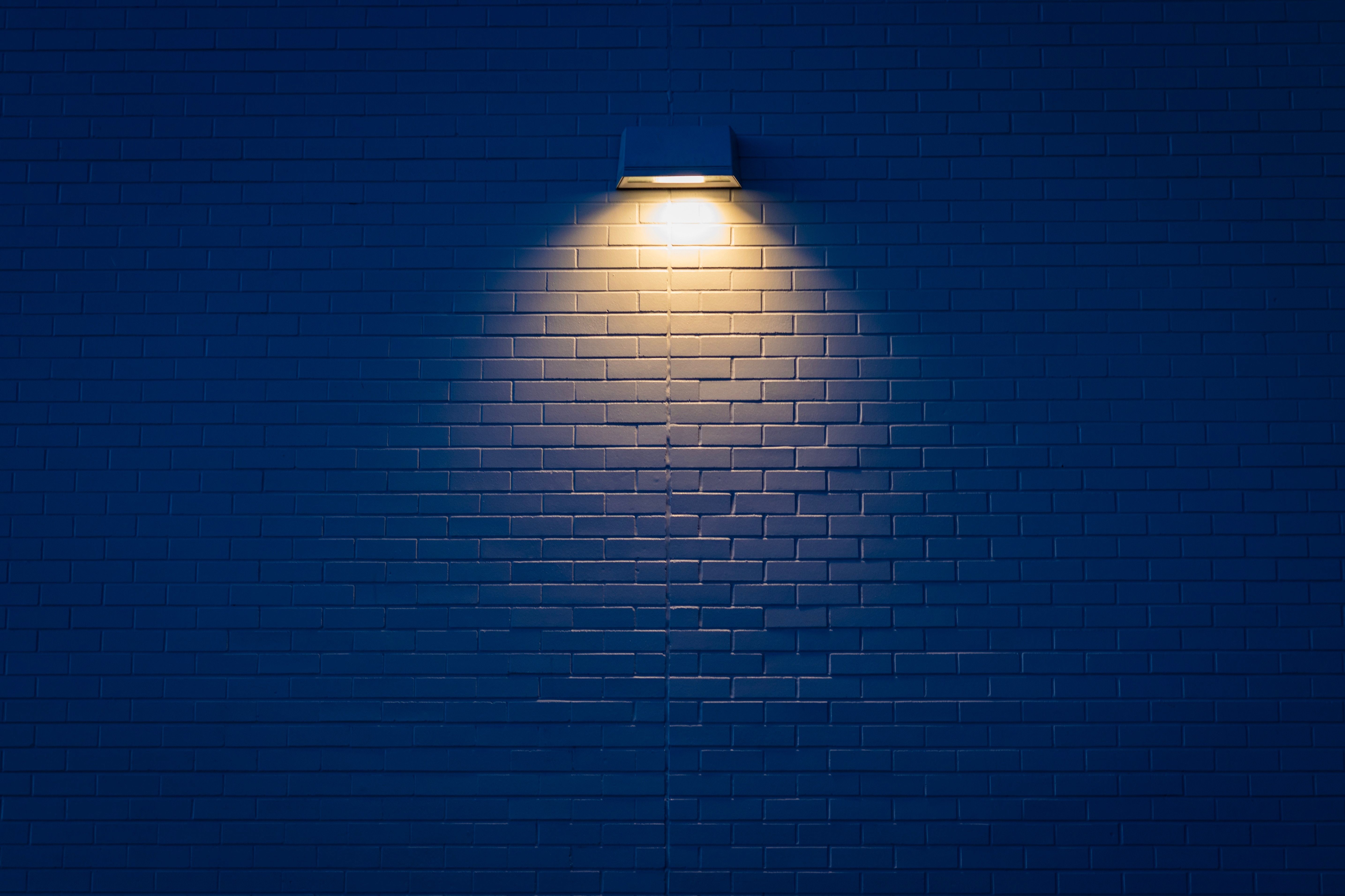 Download wallpaper 5739x3825 lamp, wall, brick, light, lighting HD