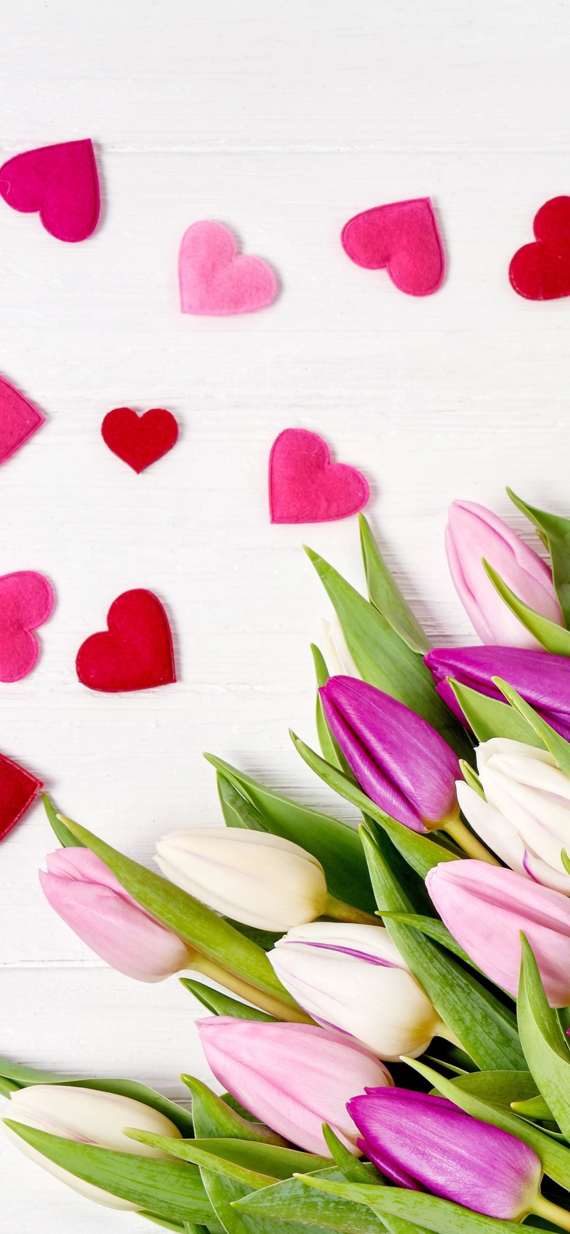 Download 1125x2436 wallpaper heart, shapes, flowers, pink tulips