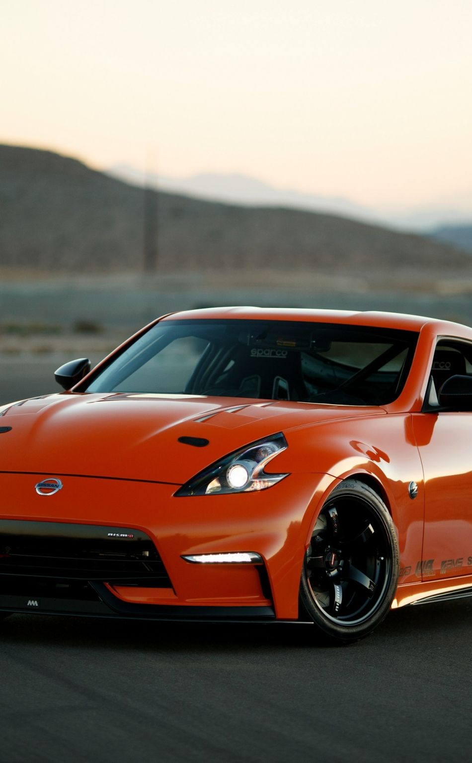 Download 950x1534 wallpaper car, front, nissan 370z nismo, iphone