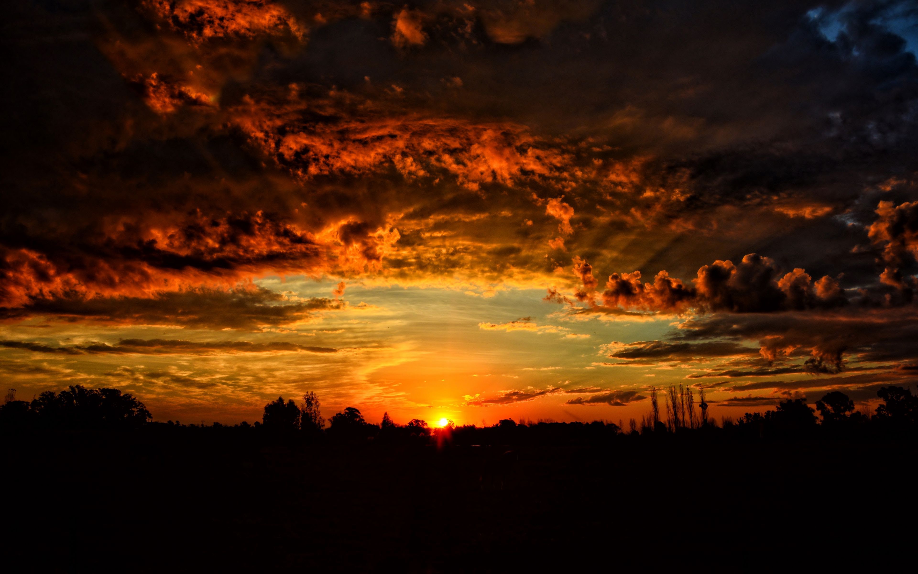 Download wallpaper 3840x2400 sunset, clouds, orange sky 4k ultra