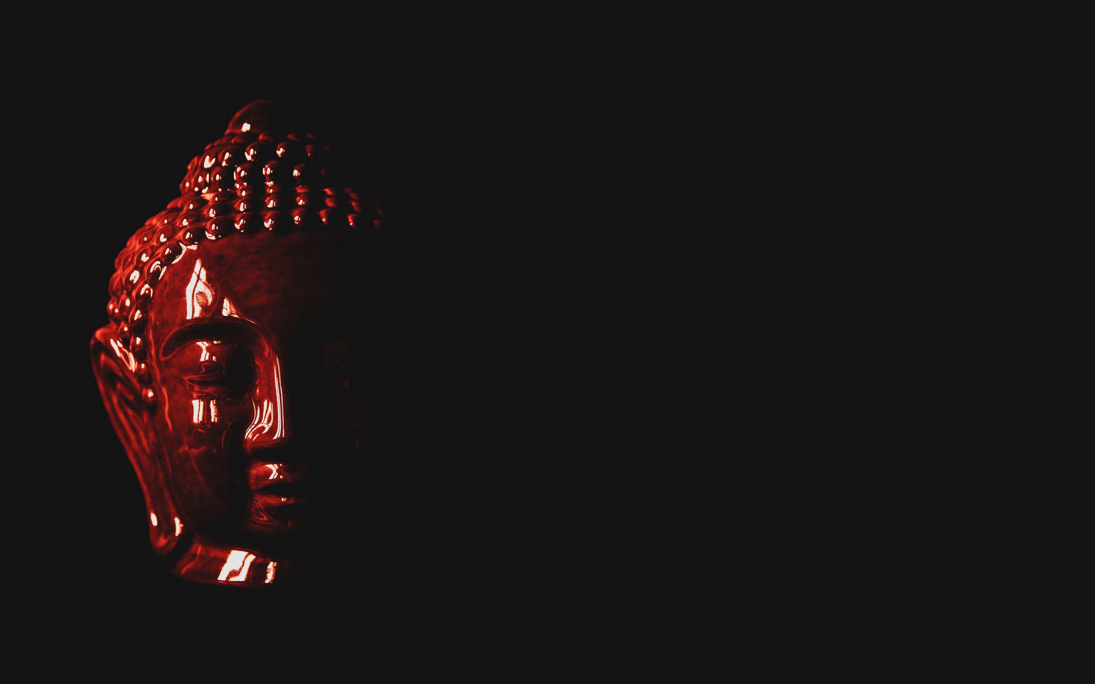 Download wallpaper 3840x2400 buddha, figurine, head, dark, red