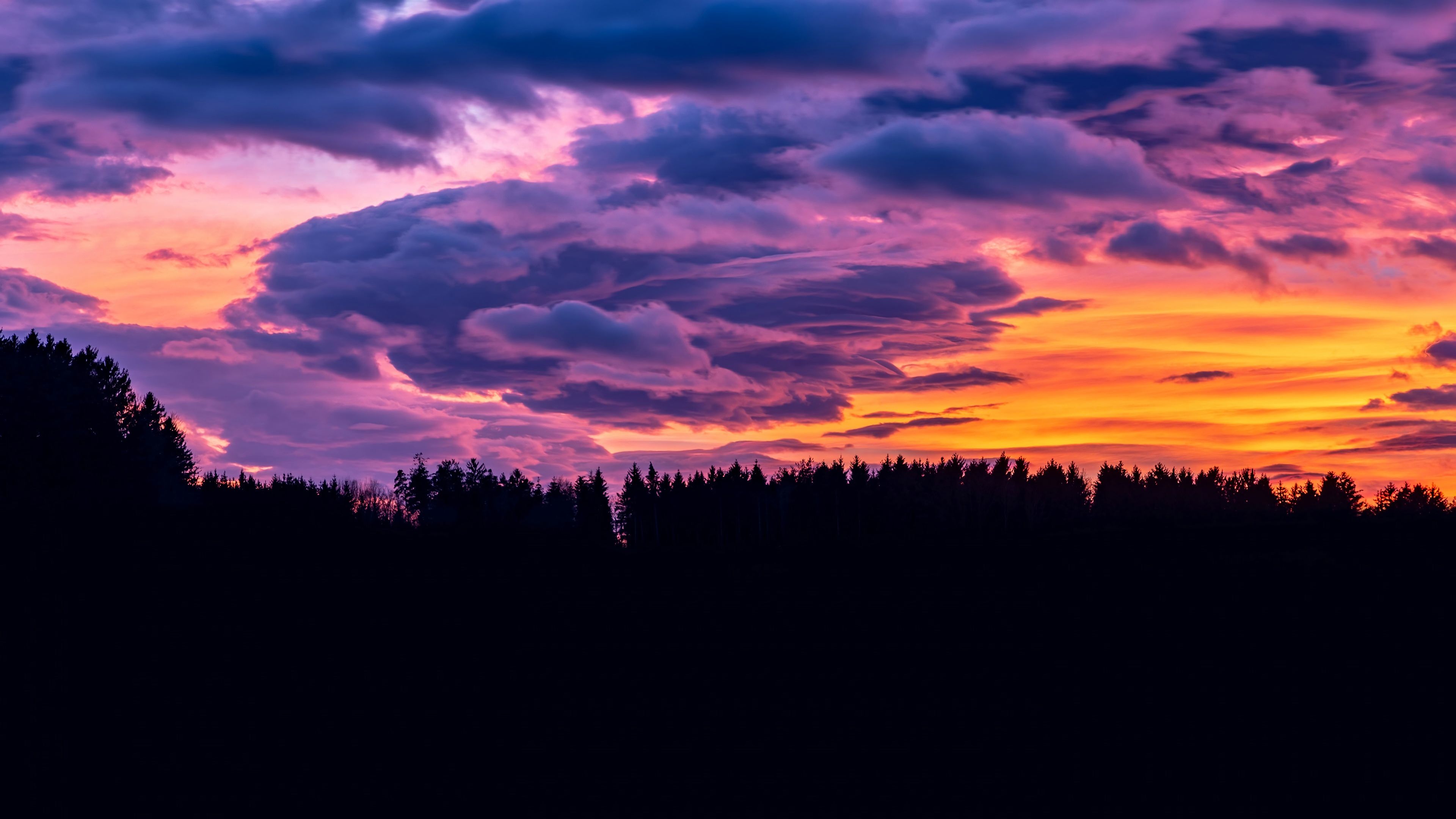 Purple Clouds at Sunset 4k Ultra HD Wallpaper. Background Image