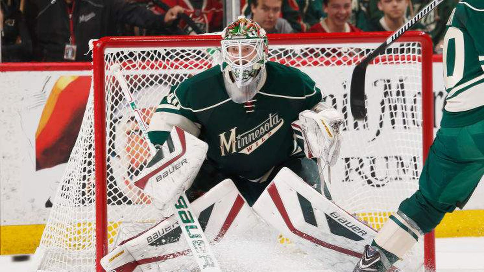 Wild locks in Dubnyk hoping to end goalie woes
