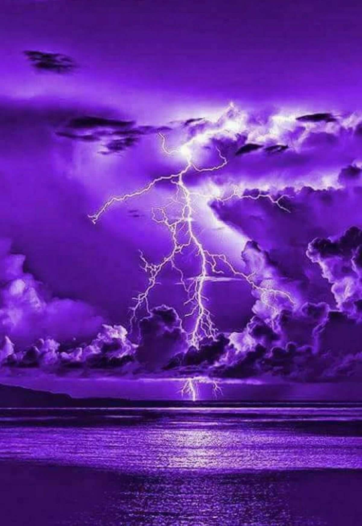 stormy clouds and lightning over the sea. All PURPLE! OK
