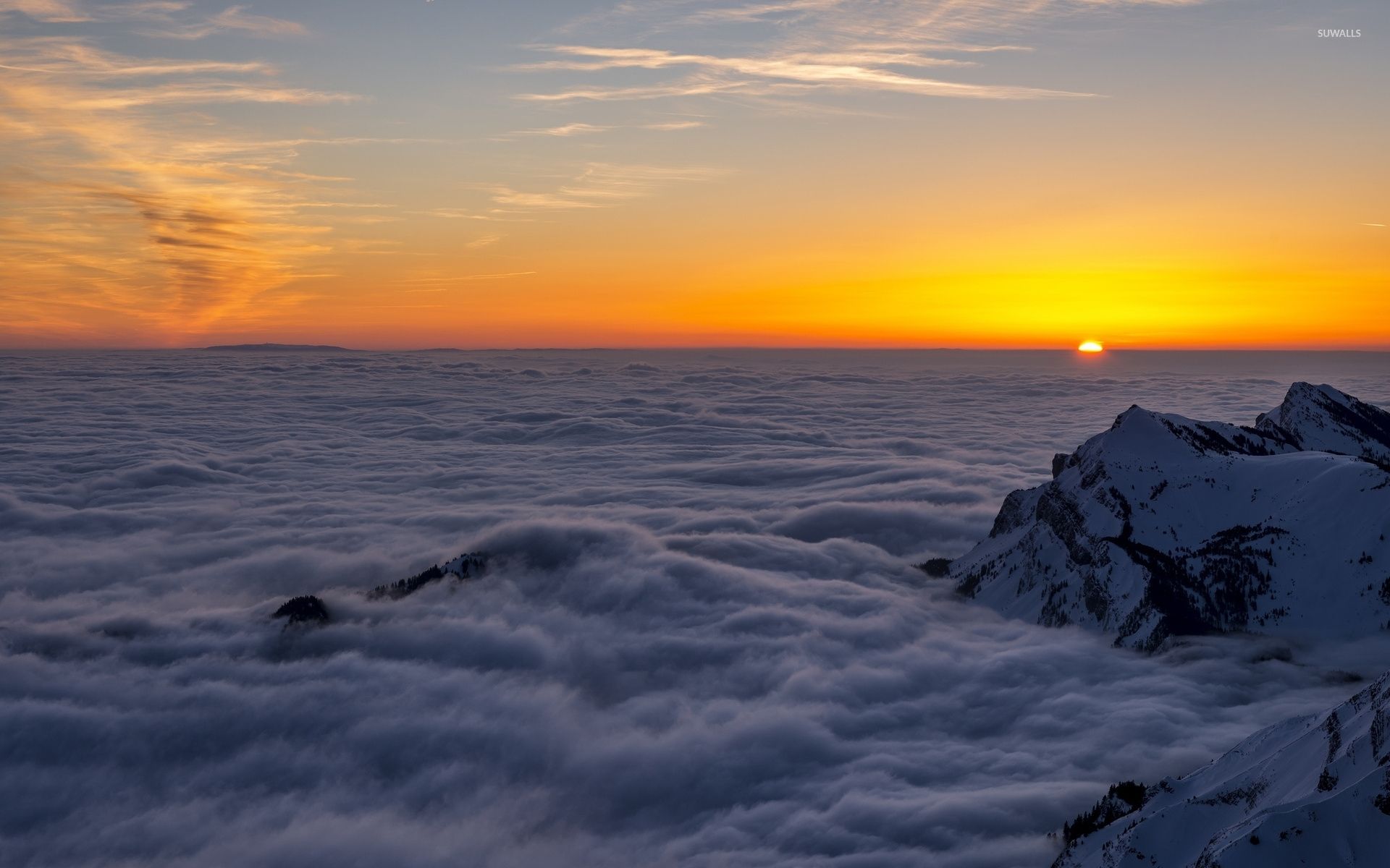 Mountain peaks over the clouds wallpaper wallpaper
