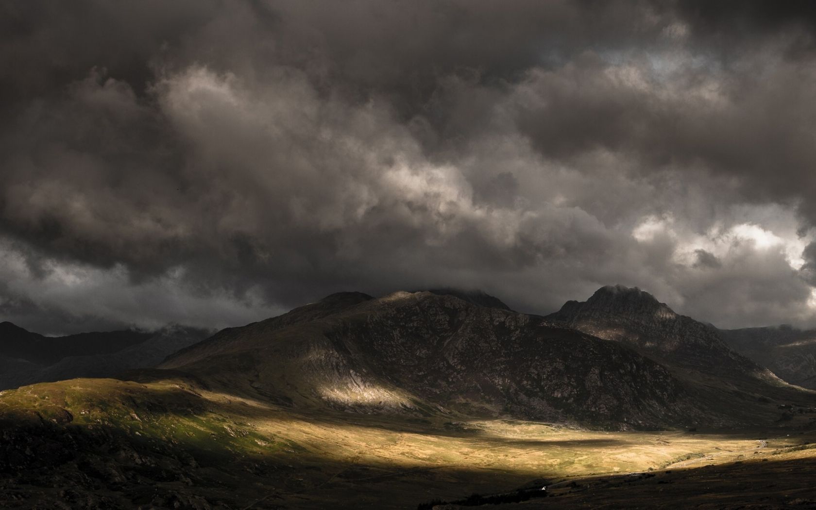 Free download Dark clouds over the mountains wallpaper and image