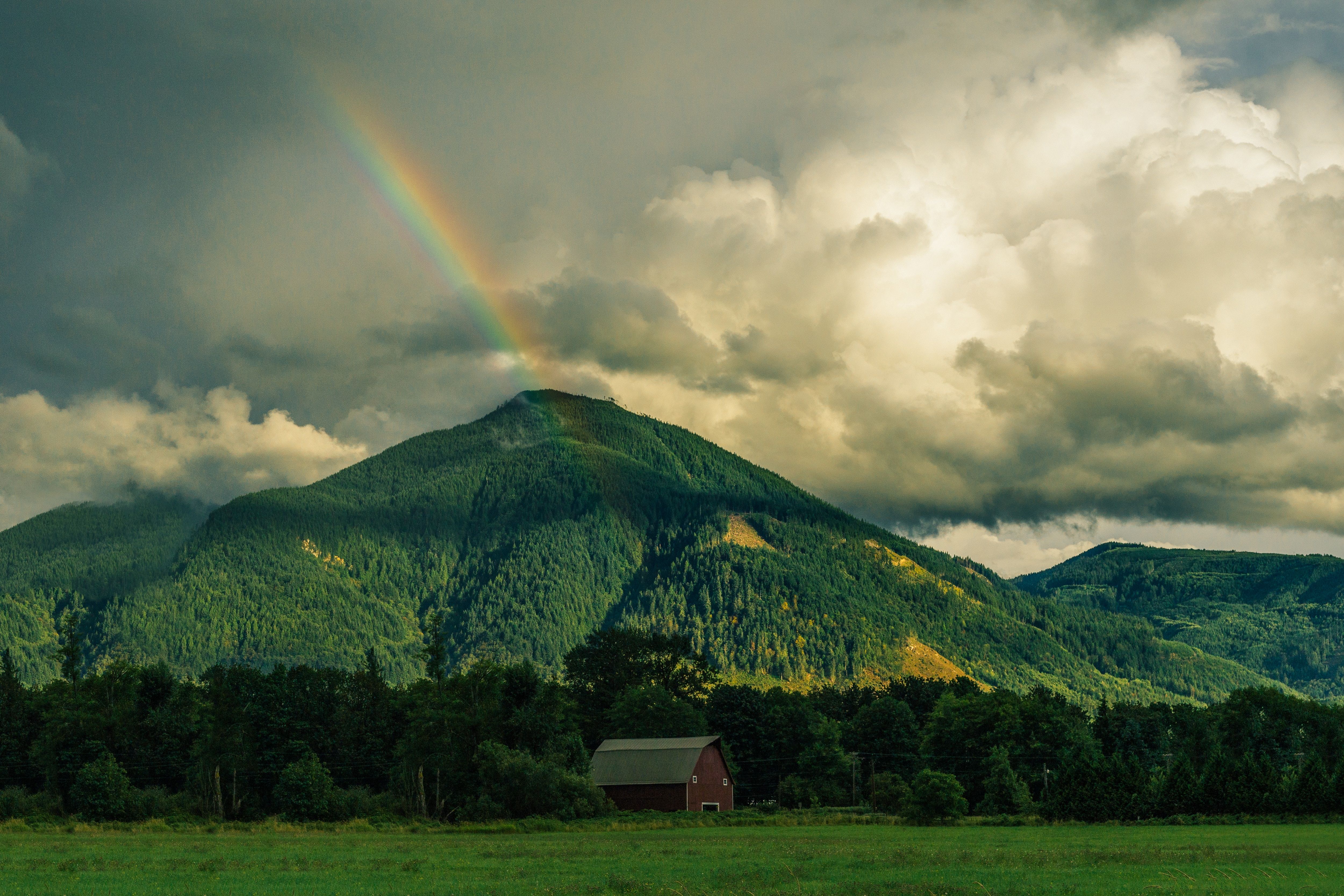 Rainbow and Clouds over Mountain 4k Ultra HD Wallpaper