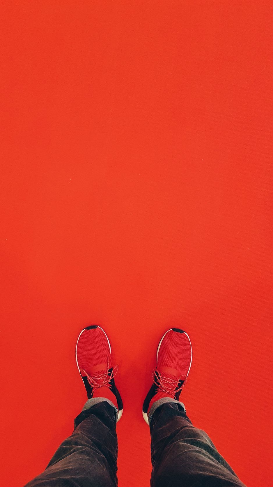 Download wallpaper 938x1668 sneakers, red, minimalism, legs iphone