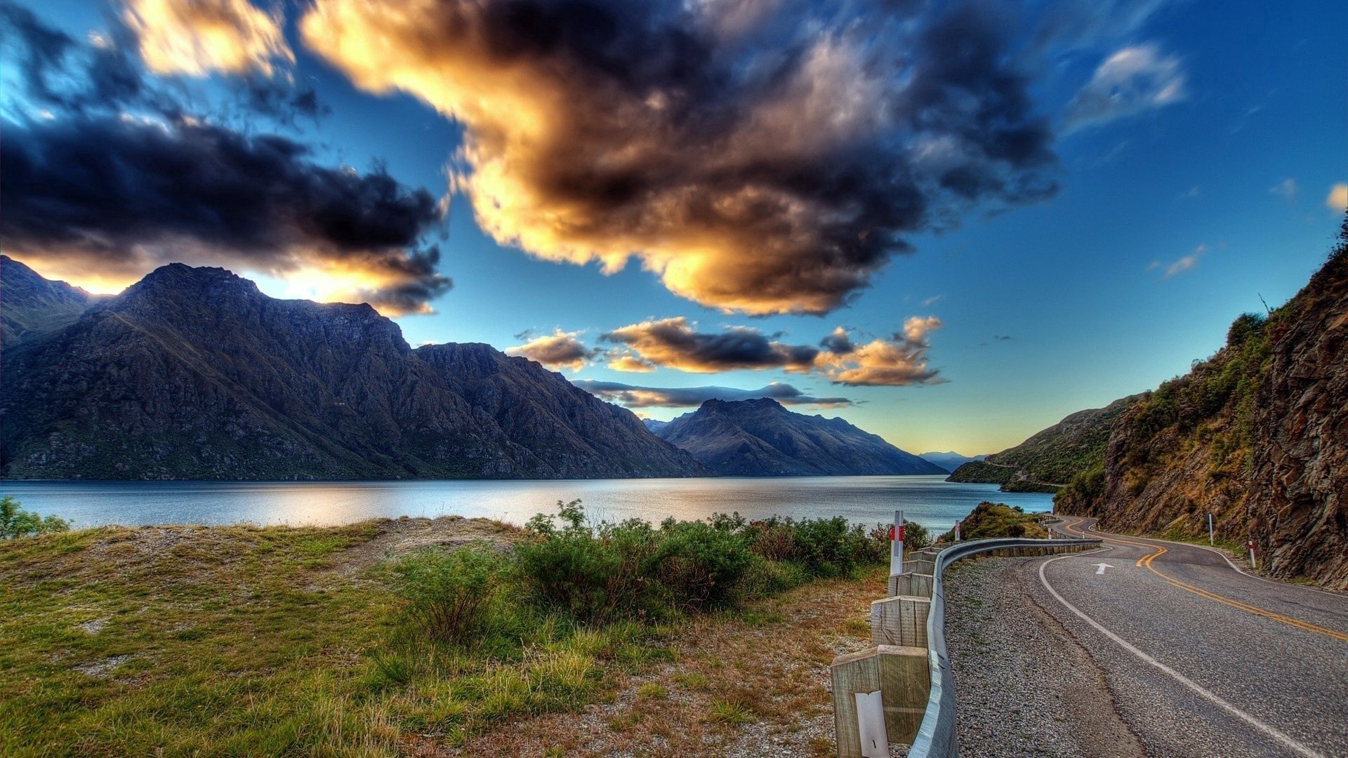 Download wallpaper 1920x1080 road, clouds, river, mountains