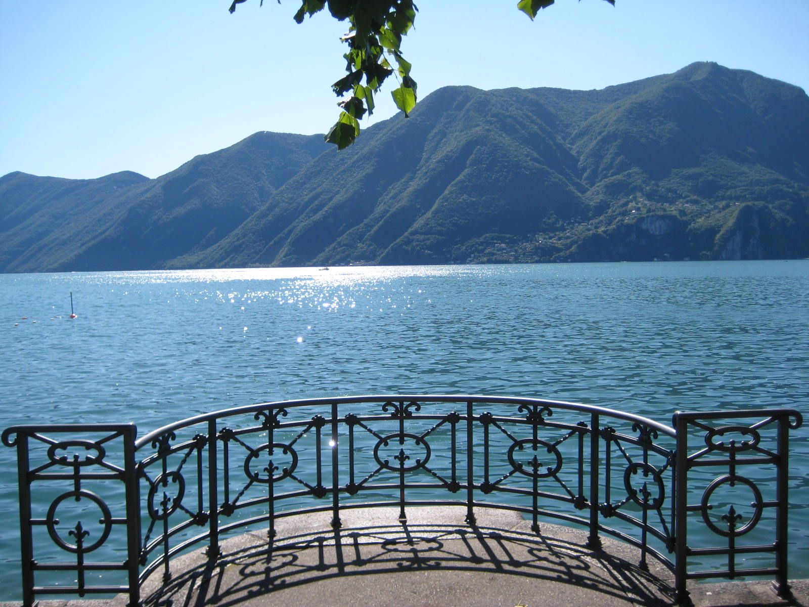Walking Lake Lugano by day, gambling Campeone d'Italia