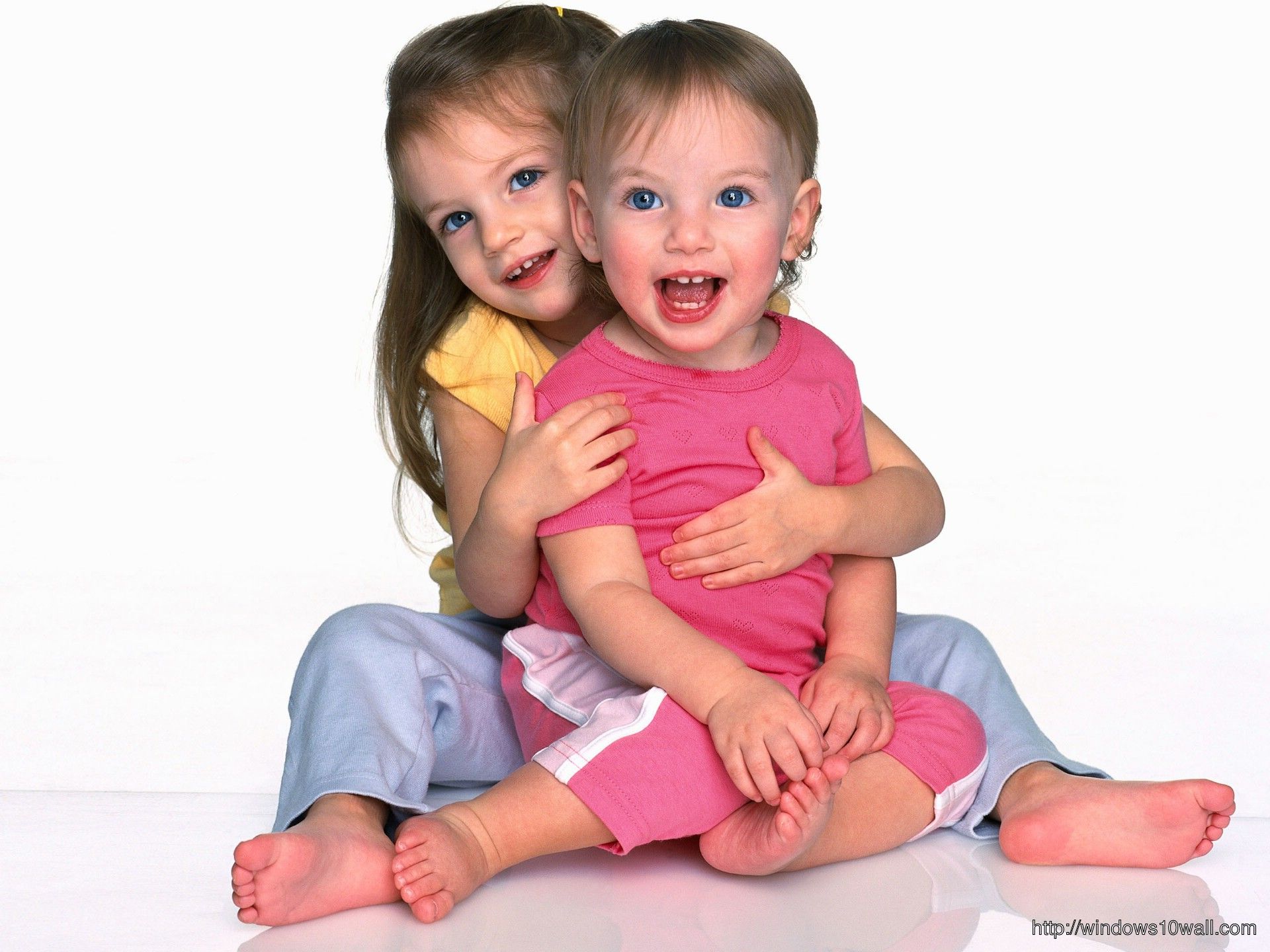 Cute Brother Sister Baby Smile Wallpapers.