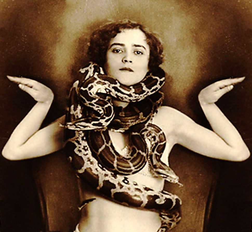 1920's Snake charmer. Vintage circus, Snake girl, Old circus