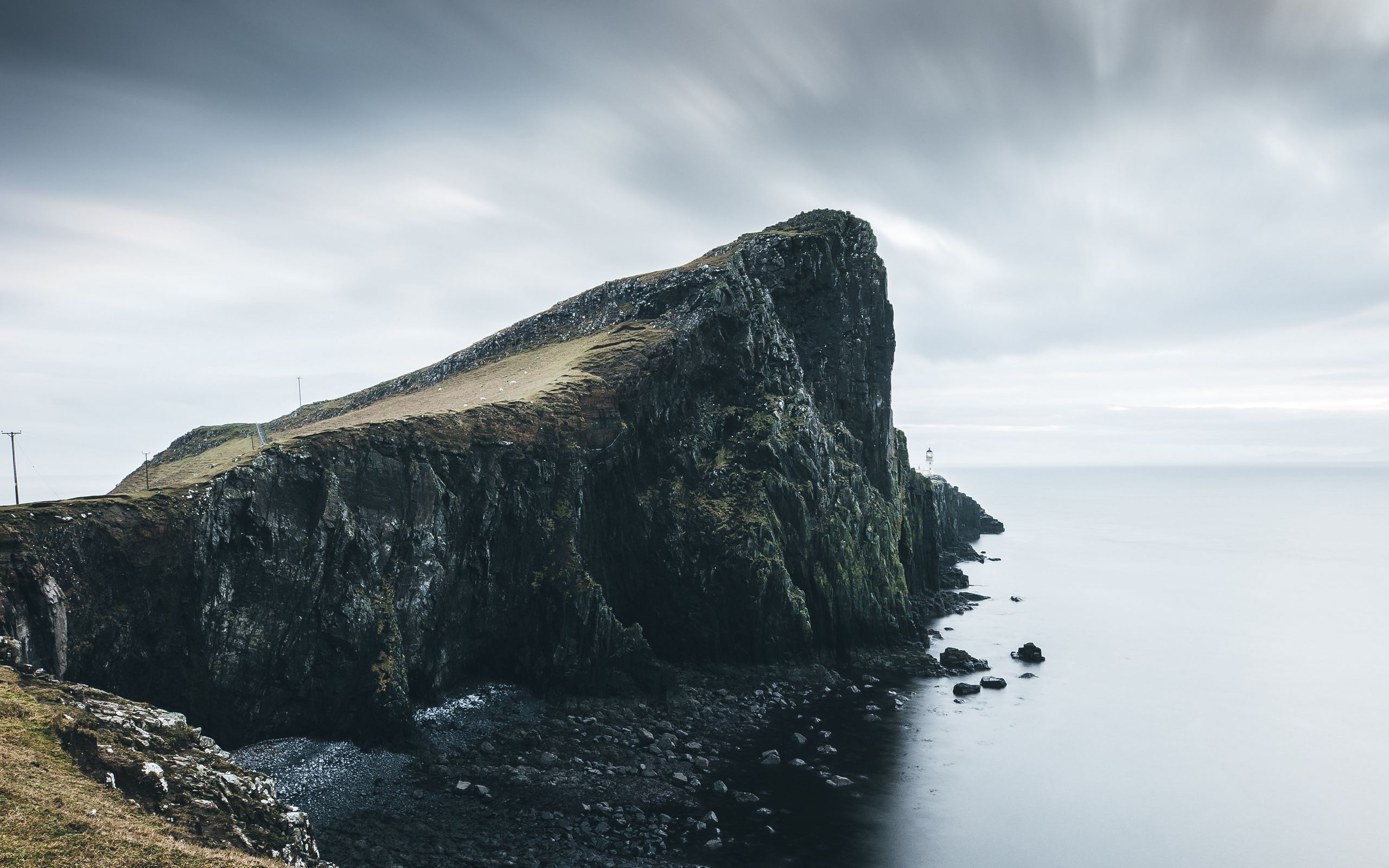 Download wallpaper 2560x1600 rock, cliff, sea, coast, stones